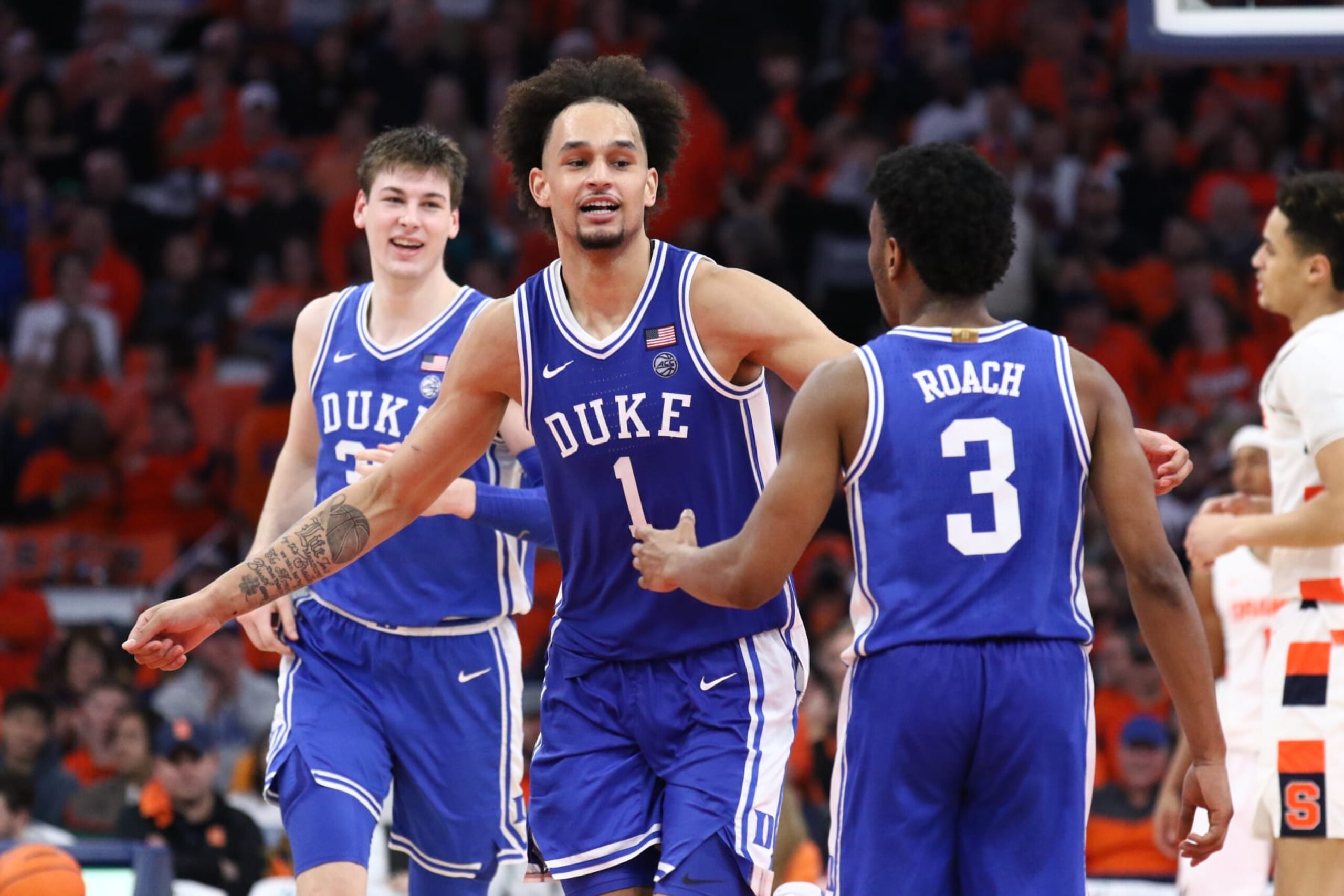Duke's Dereck Lively II (center)