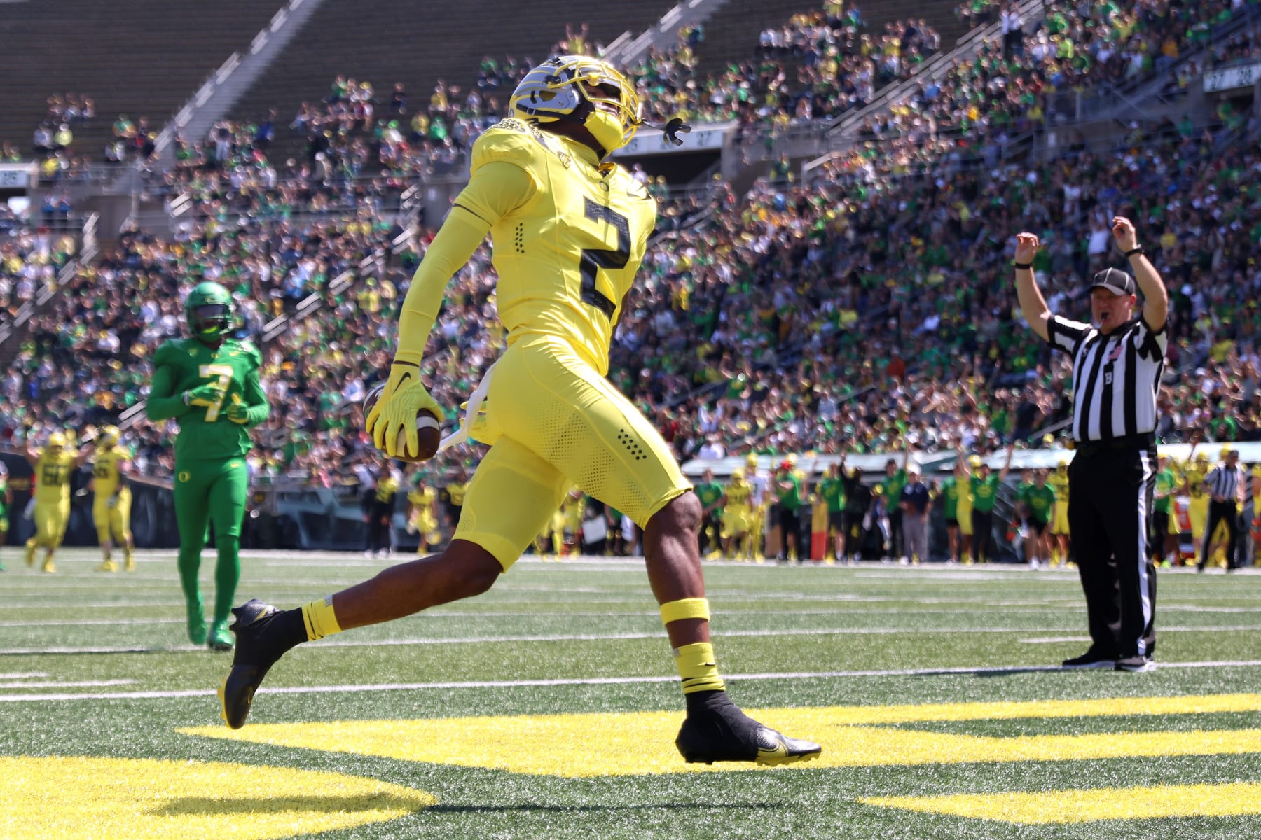 EUGENE, OREGON - APRIL 23: Donte Thornton Jr. #2 of Team Yellow scores a touchdown against Team Green during the first quarter of the Oregon Spring Game at Autzen Stadium on April 23, 2022 in Eugene, Oregon. (Photo by Abbie Parr/Getty Images)