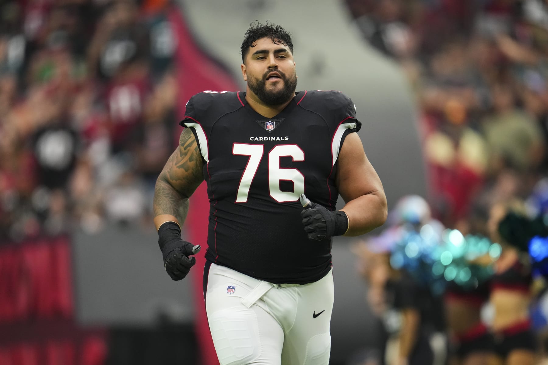 GLENDALE, AZ - OCTOBER 09: Will Hernandez #76 of the Arizona Cardinals runs out during introductions against the Philadelphia Eagles at State Farm Stadium on October 9, 2022 in Glendale, Arizona. (Photo by Cooper Neill/Getty Images)