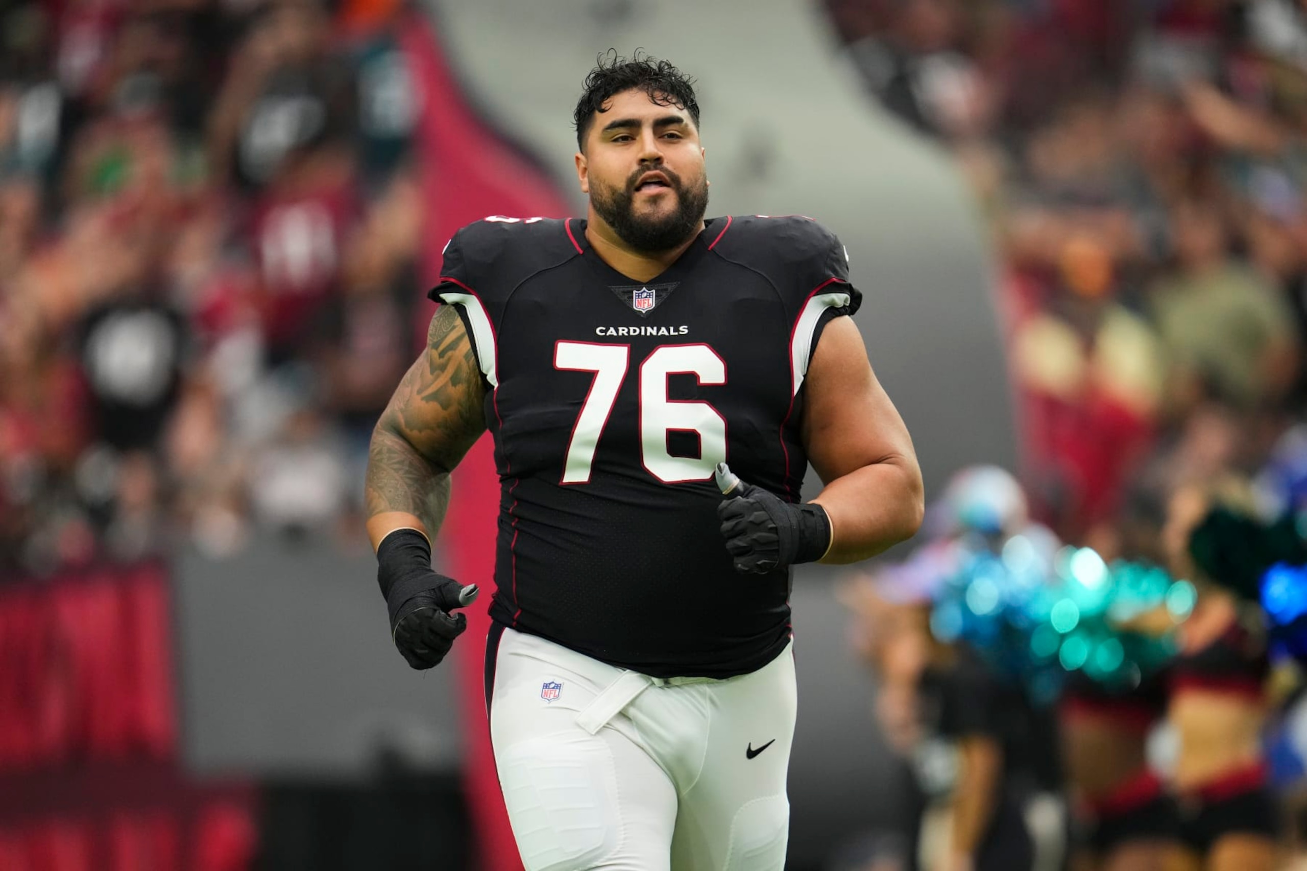 GLENDALE, AZ - OCTOBER 09: Will Hernandez #76 of the Arizona Cardinals runs out during introductions against the Philadelphia Eagles at State Farm Stadium on October 9, 2022 in Glendale, Arizona. (Photo by Cooper Neill/Getty Images)