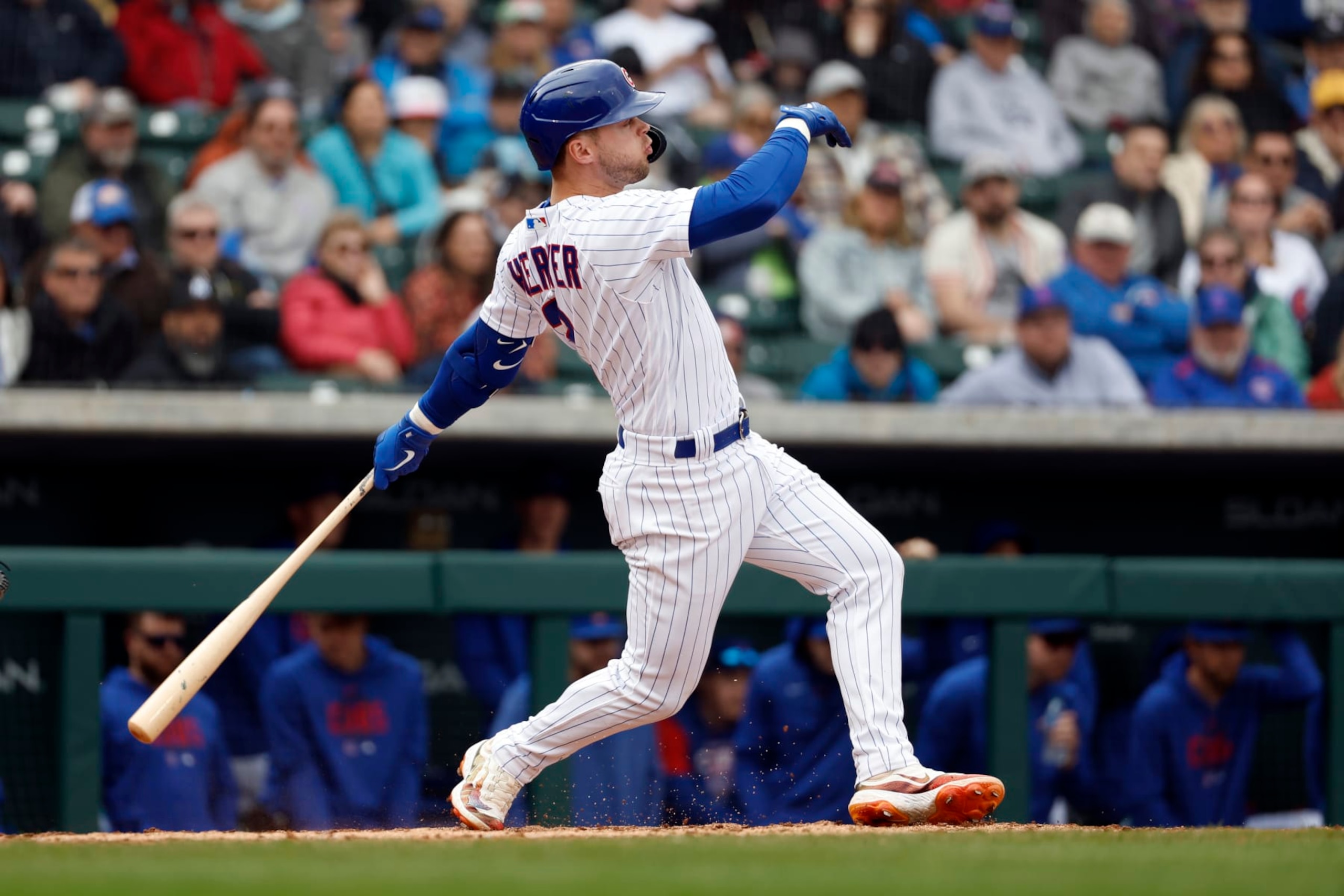 MESA, ARIZONA - MARCH 01: Nico Hoerner #2 of the Chicago Cubs hits a ground ball during the fourth inning of a spring training game against the Seattle Mariners at Sloan Park on March 01, 2023 in Mesa, Arizona. (Photo by Chris Coduto/Getty Images)