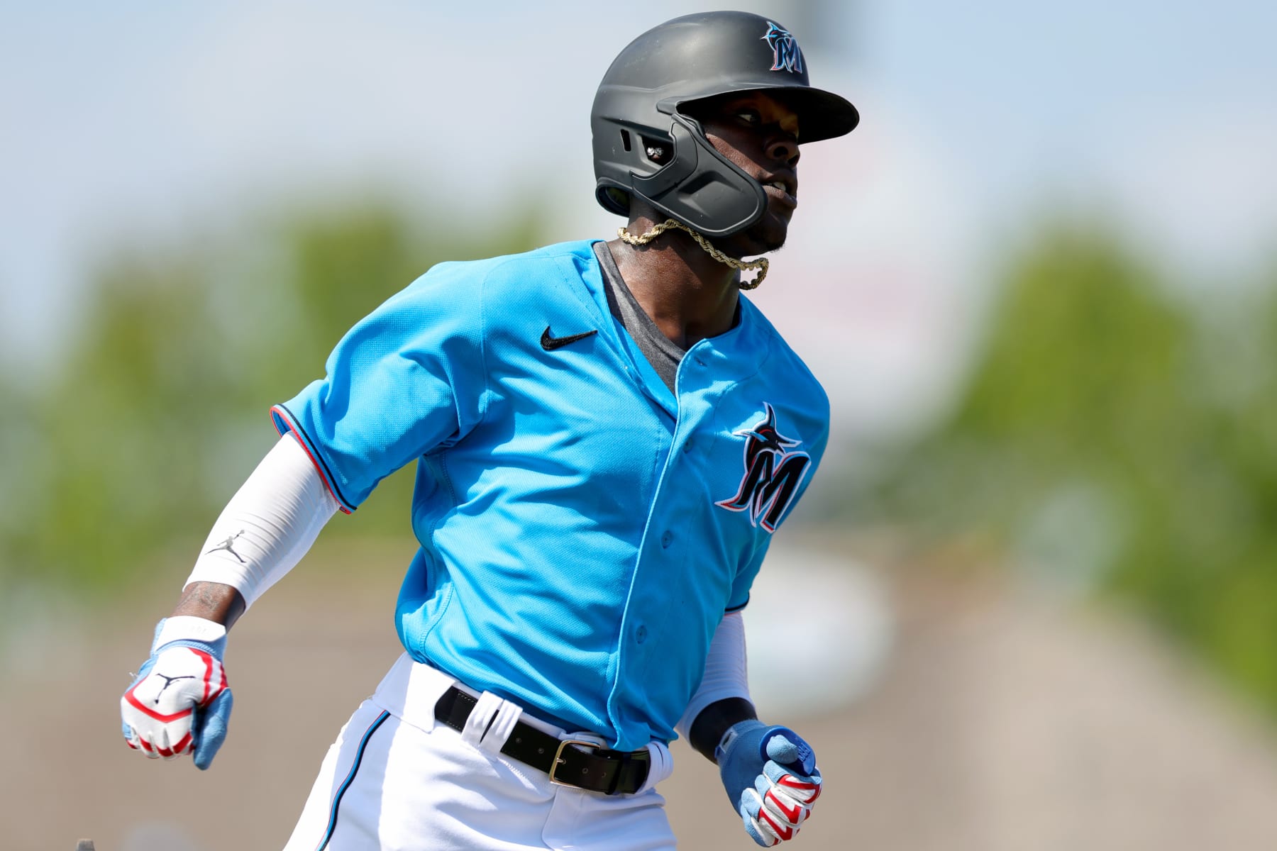 JUPITER, FLORIDA - MARCH 07: Jazz Chisholm Jr. #2 of the Miami Marlins runs to first base against the Washington Nationals during the third inning of the spring training game at Roger Dean Stadium on March 07, 2023 in Jupiter, Florida. (Photo by Megan Briggs/Getty Images)
