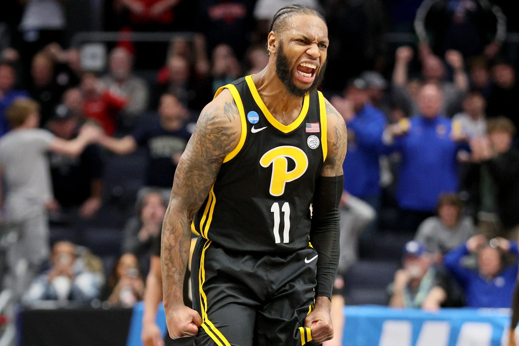 DAYTON, OHIO - MARCH 14: Jamarius Burton #11 of the Pittsburgh Panthers reacts to a play against the Mississippi State Bulldogs during the second half in the First Four game of the NCAA Men's Basketball Tournament at University of Dayton Arena on March 14, 2023 in Dayton, Ohio. (Photo by Andy Lyons/Getty Images)
