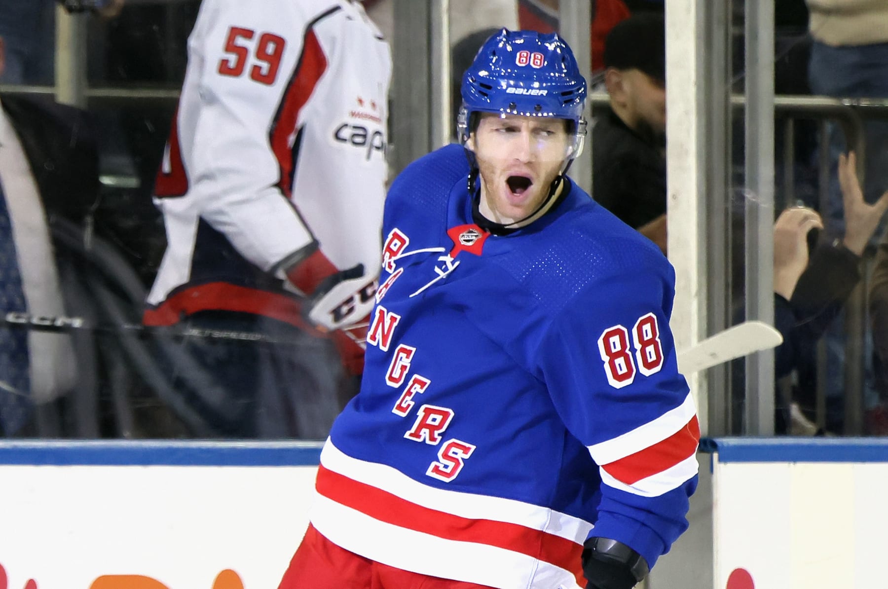 NEW YORK, NEW YORK - MARCH 14: Patrick Kane #88 of the New York Rangers scores a powerplay goal against the Washington Capitals at 18:46 of the first period at Madison Square Garden on March 14, 2023 in New York City. (Photo by Bruce Bennett/Getty Images)