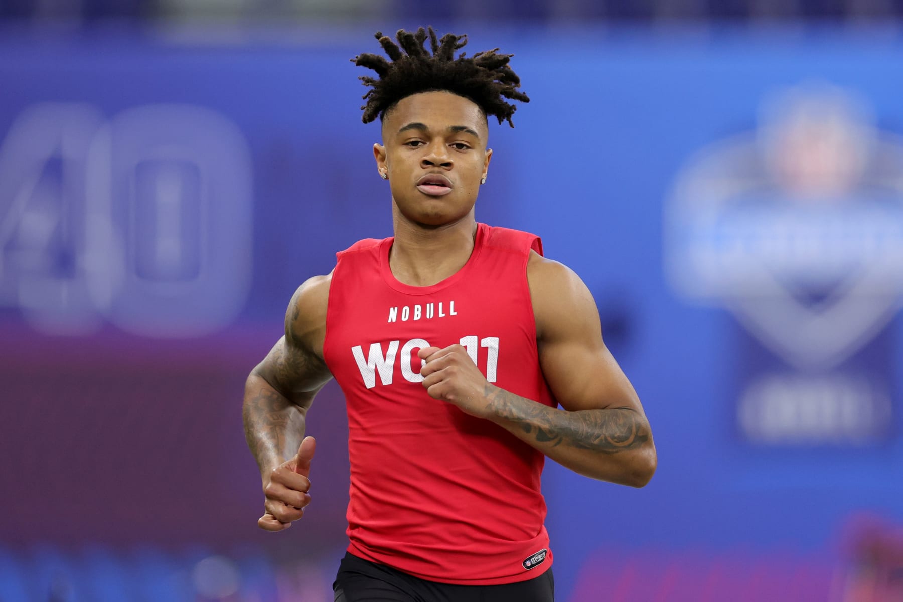 INDIANAPOLIS, INDIANA - MARCH 04: Tank Dell of Houston participates in the 40-yard dash during the NFL Combine at Lucas Oil Stadium on March 04, 2023 in Indianapolis, Indiana. (Photo by Stacy Revere/Getty Images)