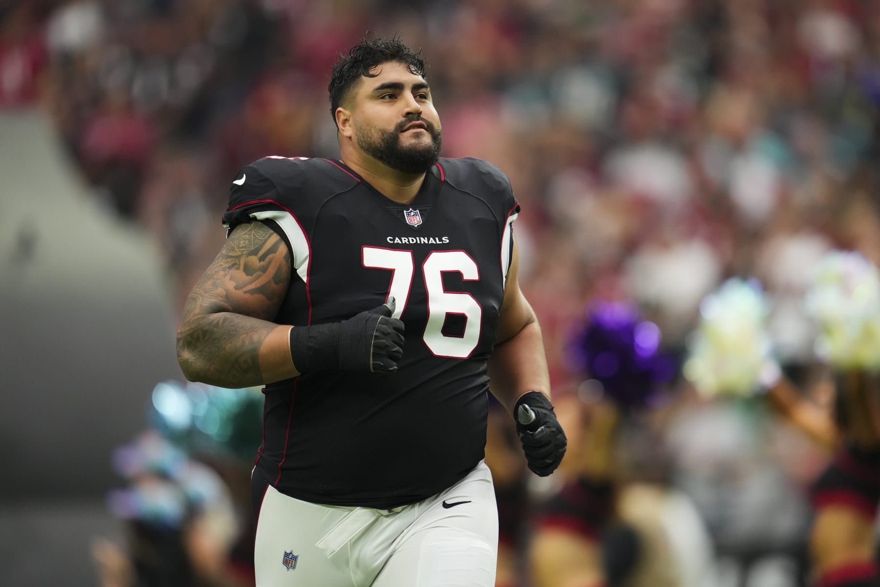 GLENDALE, AZ - OCTOBER 09: Will Hernandez #76 of the Arizona Cardinals runs out during introductions against the Philadelphia Eagles at State Farm Stadium on October 9, 2022 in Glendale, Arizona. (Photo by Cooper Neill/Getty Images)