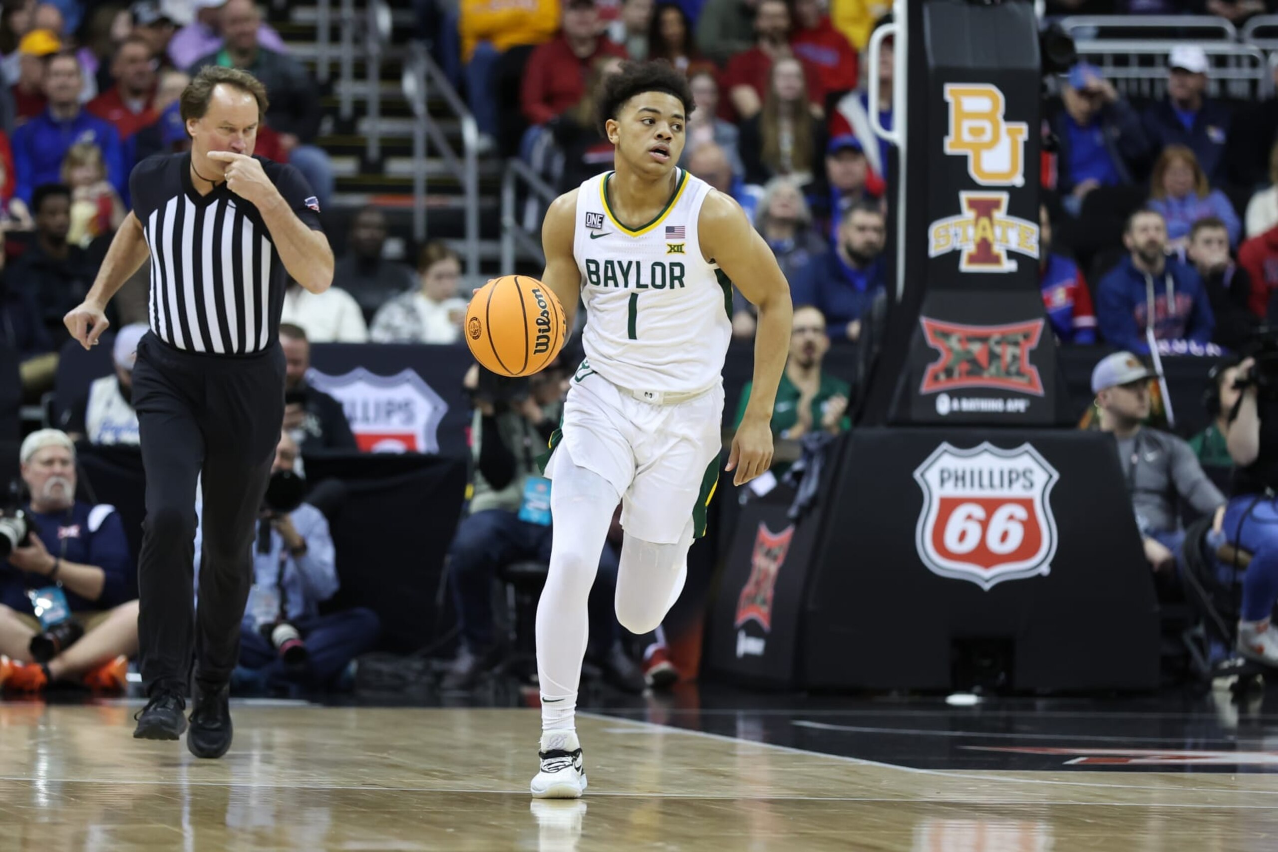 KANSAS CITY, MO - MARCH 09: Baylor Bears guard Keyonte George (1) brings the ball up court in the first half of a Big 12 Tournament quarterfinal basketball game between the Iowa State Cyclones and Baylor Bears on March 9, 2023 at T-Mobile Center in Kansas City, MO. (Photo by Scott Winters/Icon Sportswire via Getty Images)