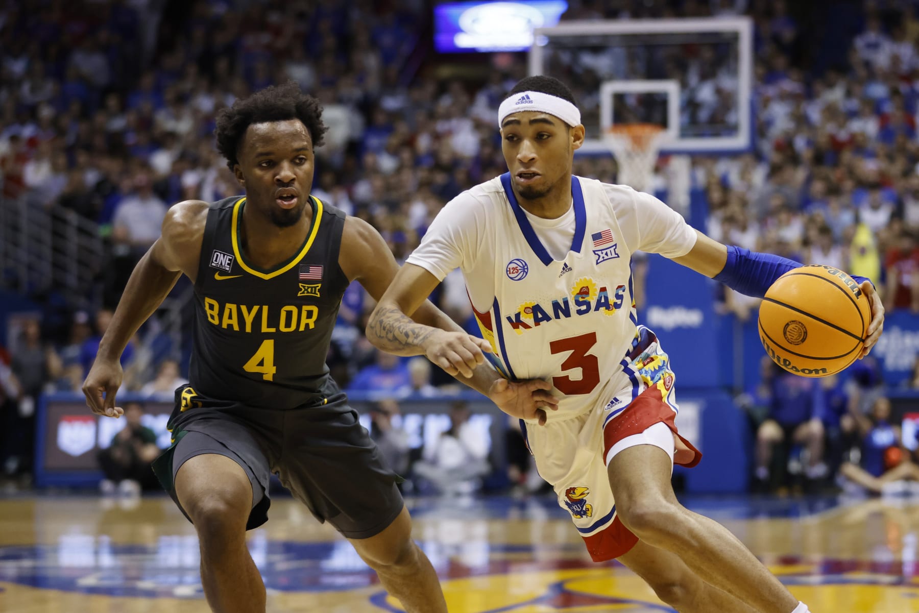 Kansas' Dajuan Harris Jr. and Baylor's LJ Cryer
