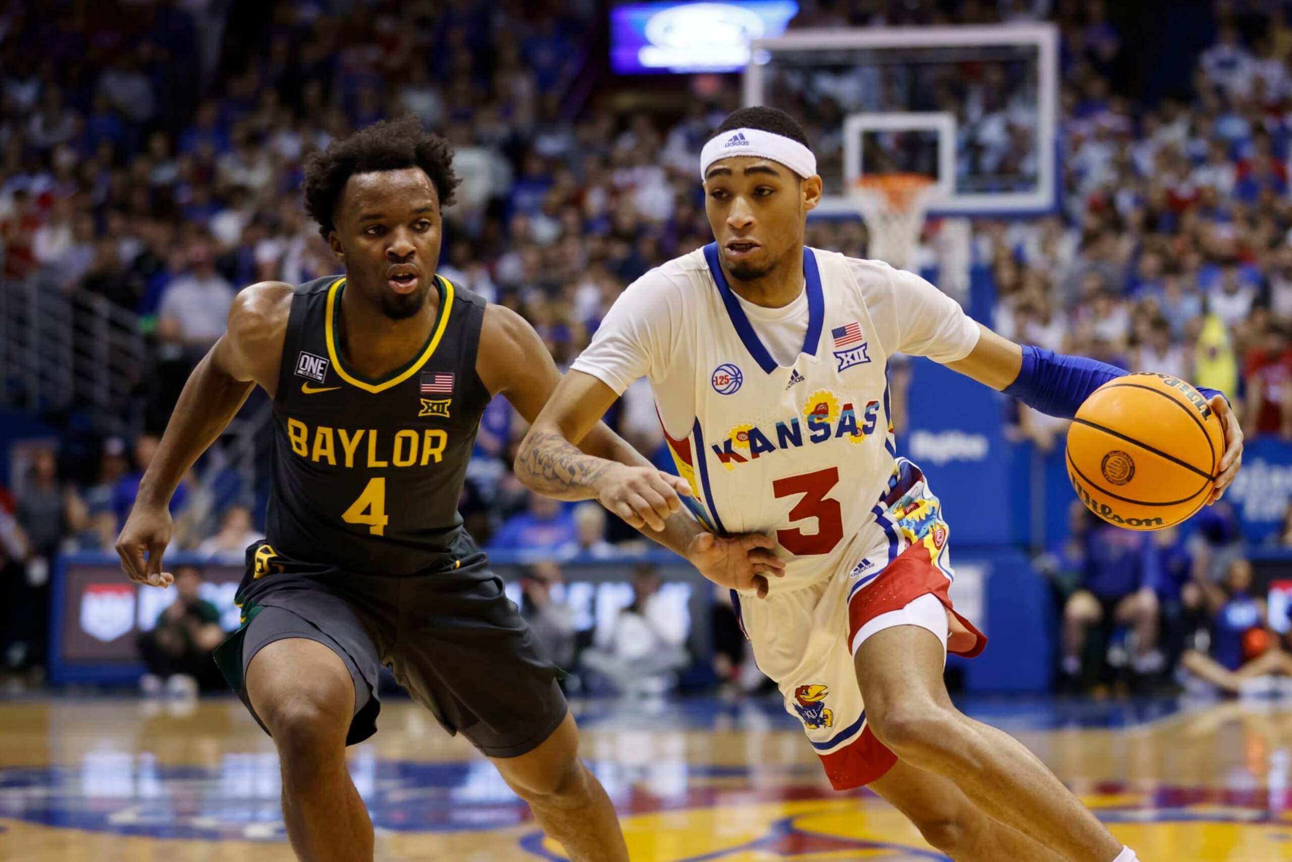 Kansas' Dajuan Harris Jr. and Baylor's LJ Cryer