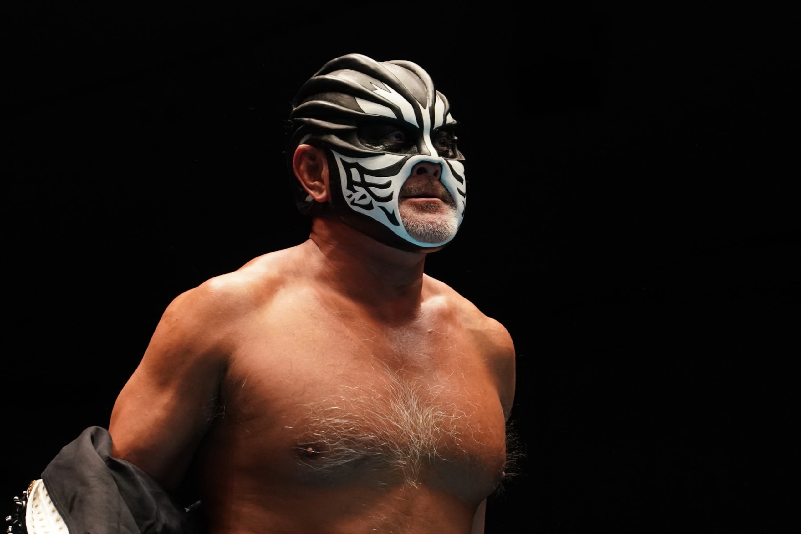 TOKYO, JAPAN - NOVEMBER 09: The Great Muta  enters the ring during the Pro-Wrestling 'Dradition' -ãTatsumi Fujinami 50th Anniversary at Korakuen Hall on November 09, 2021 in Tokyo, Japan. (Photo by Etsuo Hara/Getty Images)