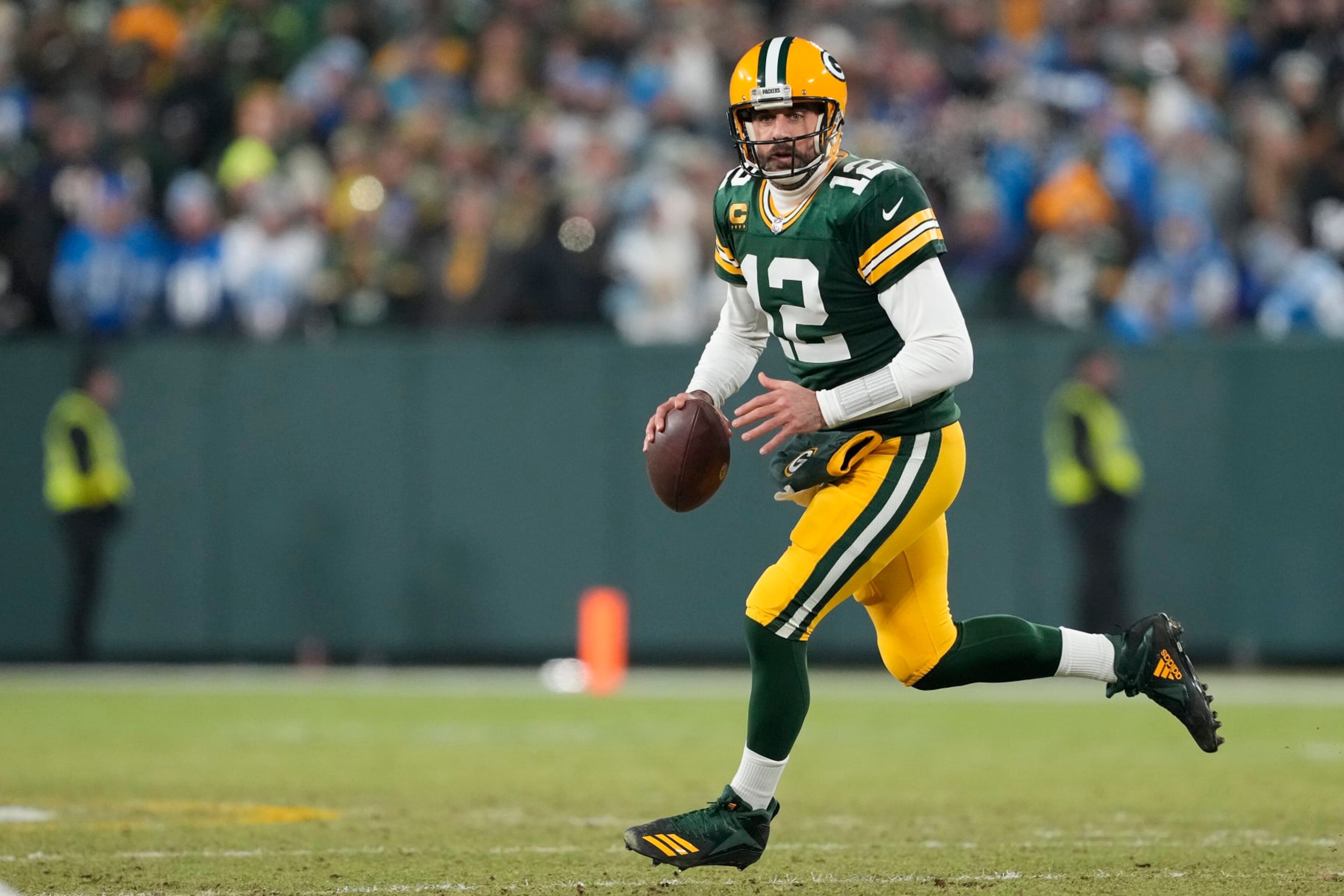 GREEN BAY, WISCONSIN - JANUARY 08: Aaron Rodgers #12 of the Green Bay Packers looks to throw a pass against the Detroit Lions in the first half at Lambeau Field on January 08, 2023 in Green Bay, Wisconsin. (Photo by Patrick McDermott/Getty Images) GREEN BAY, WISCONSIN - JANUARY 08: Aaron Rodgers #12 of the Green Bay Packers looks to throw a pass against the Detroit Lions in the first half at Lambeau Field on January 08, 2023 in Green Bay, Wisconsin. (Photo by Patrick McDermott/Getty Images)