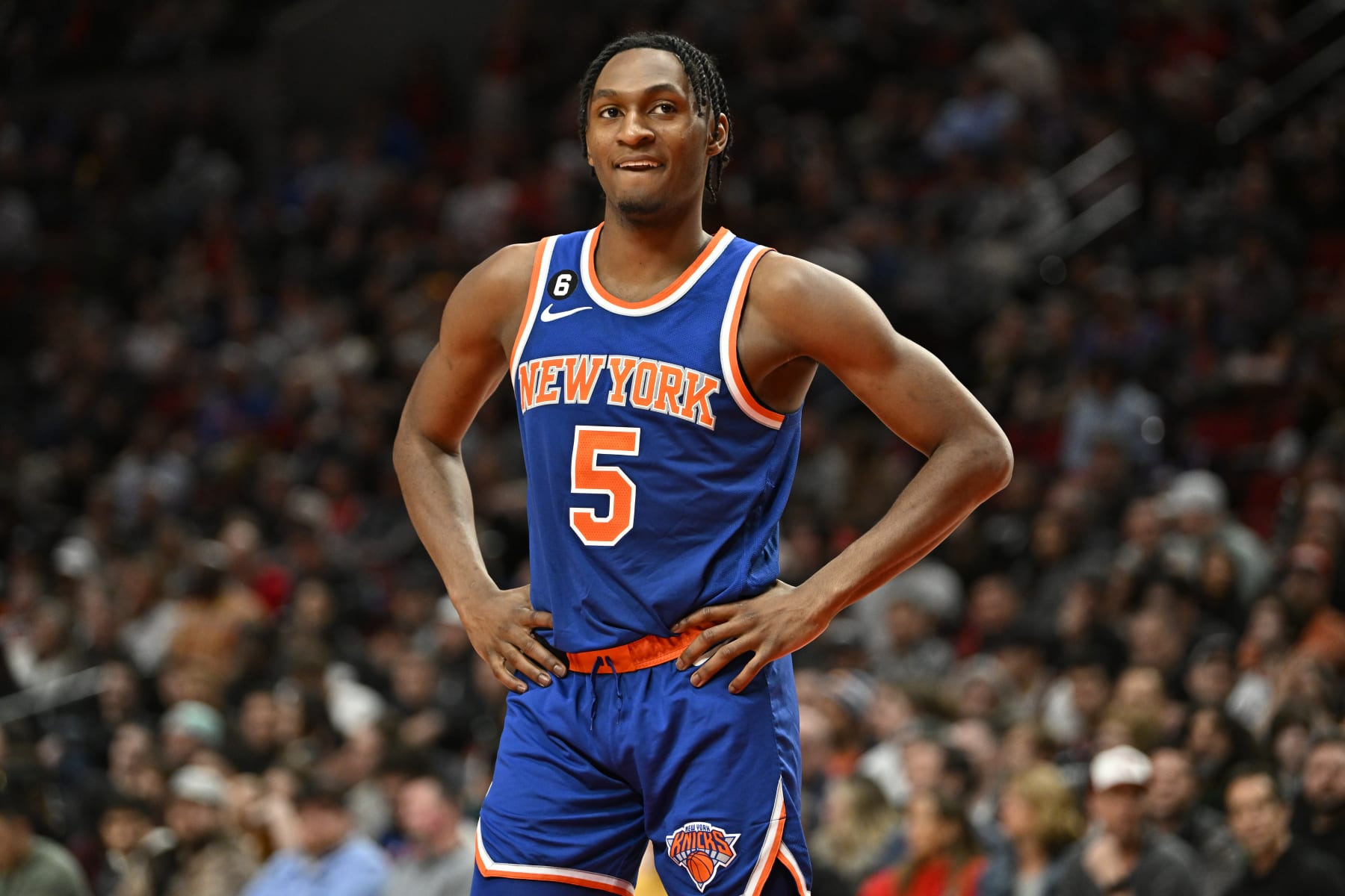 PORTLAND, OREGON - MARCH 14: Immanuel Quickley #5 of the New York Knicks looks on during the second quarter against the Portland Trail Blazers at Moda Center on March 14, 2023 in Portland, Oregon. The New York Knicks won 123-107. NOTE TO USER: User expressly acknowledges and agrees that, by downloading and or using this photograph, User is consenting to the terms and conditions of the Getty Images License Agreement. (Photo by Alika Jenner/Getty Images)