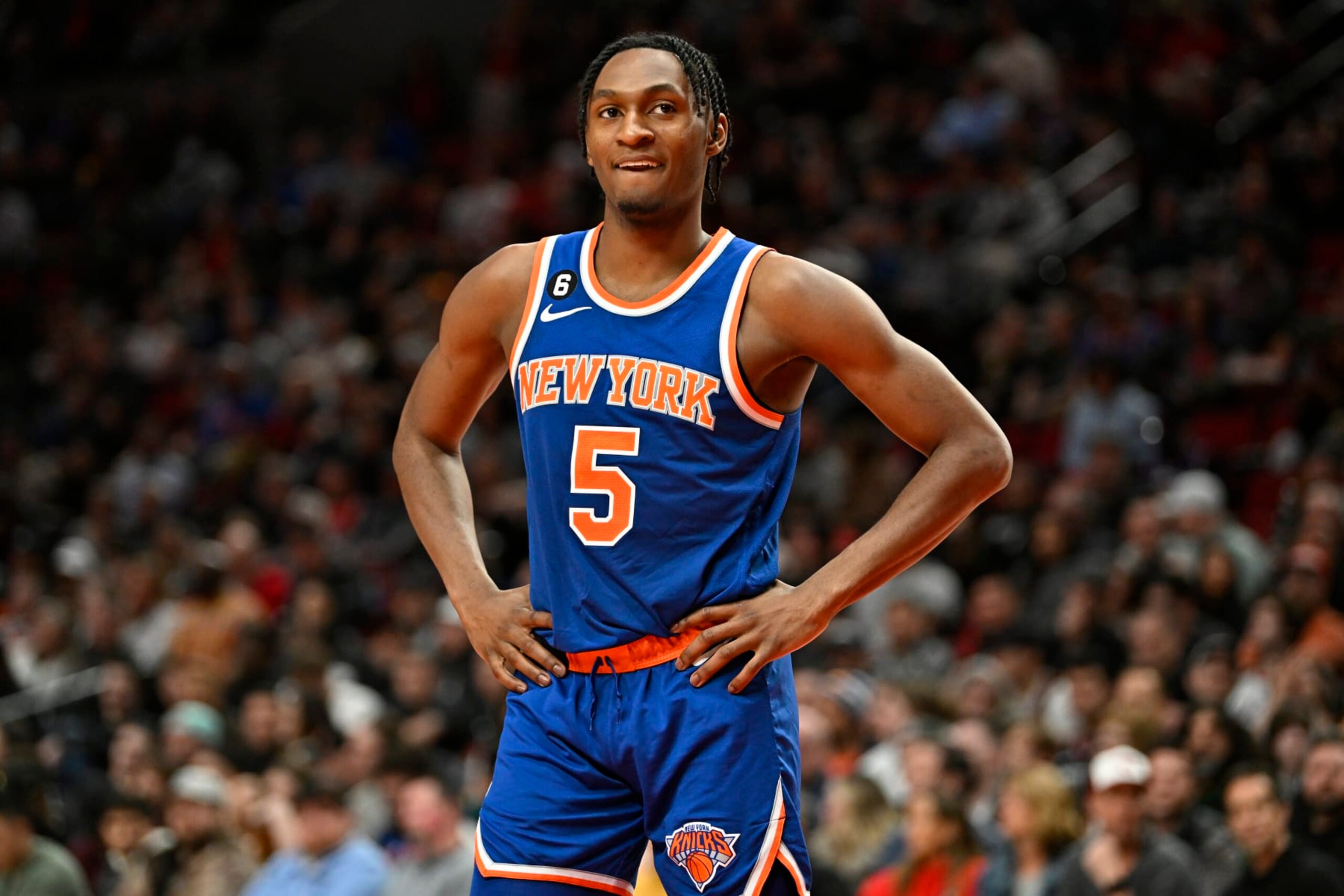 PORTLAND, OREGON - MARCH 14: Immanuel Quickley #5 of the New York Knicks looks on during the second quarter against the Portland Trail Blazers at Moda Center on March 14, 2023 in Portland, Oregon. The New York Knicks won 123-107. NOTE TO USER: User expressly acknowledges and agrees that, by downloading and or using this photograph, User is consenting to the terms and conditions of the Getty Images License Agreement. (Photo by Alika Jenner/Getty Images)