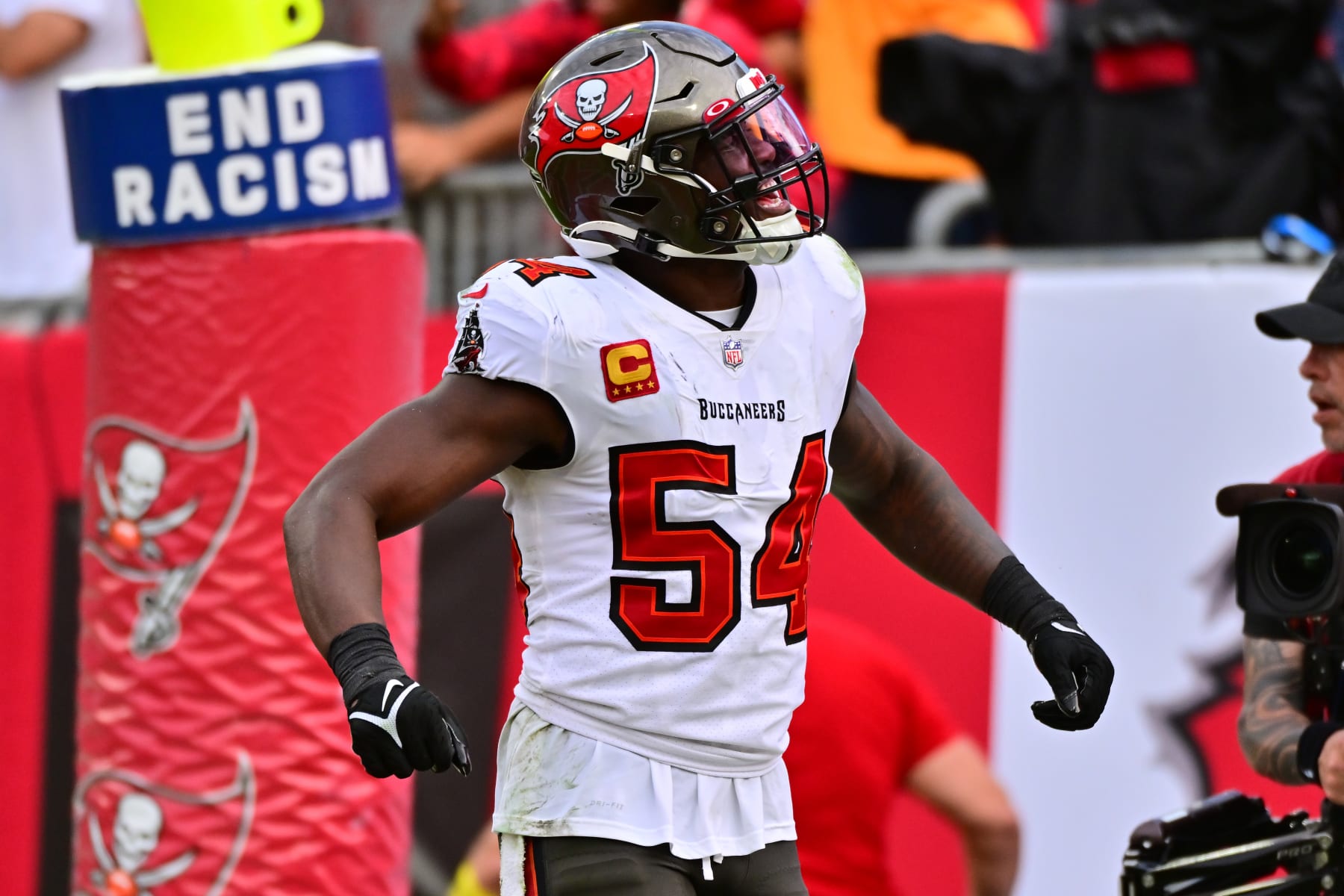TAMPA, FLORIDA - JANUARY 01: Lavonte David #54 of the Tampa Bay Buccaneers reacts after the Tampa Bay Buccaneers recovered a fumble during the fourth quarter against the Carolina Panthers at Raymond James Stadium on January 01, 2023 in Tampa, Florida. (Photo by Julio Aguilar/Getty Images)