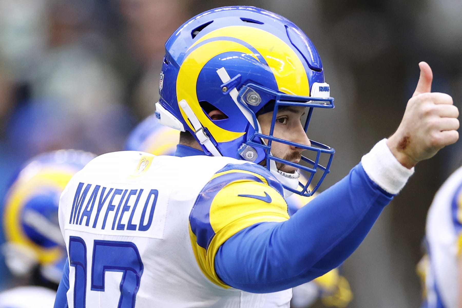 SEATTLE, WASHINGTON - JANUARY 08: Baker Mayfield #17 of the Los Angeles Rams reacts during the first half against the Seattle Seahawks at Lumen Field on January 08, 2023 in Seattle, Washington. (Photo by Steph Chambers/Getty Images)