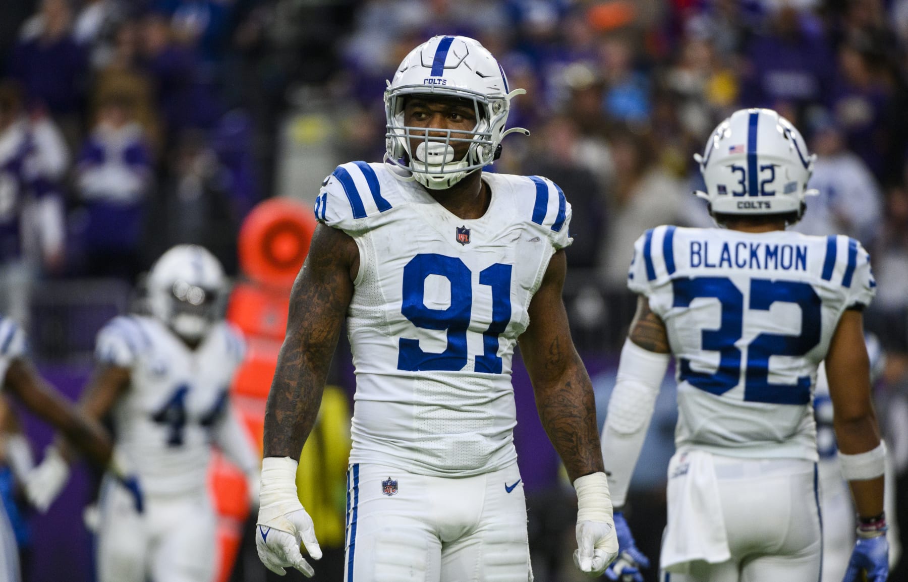 MINNEAPOLIS, MN - DECEMBER 17: Yannick Ngakoue #91 of the Indianapolis Colts stands between plays in the fourth quarter of the game against the Minnesota Vikings at U.S. Bank Stadium on December 17, 2022 in Minneapolis, Minnesota. (Photo by Stephen Maturen/Getty Images)