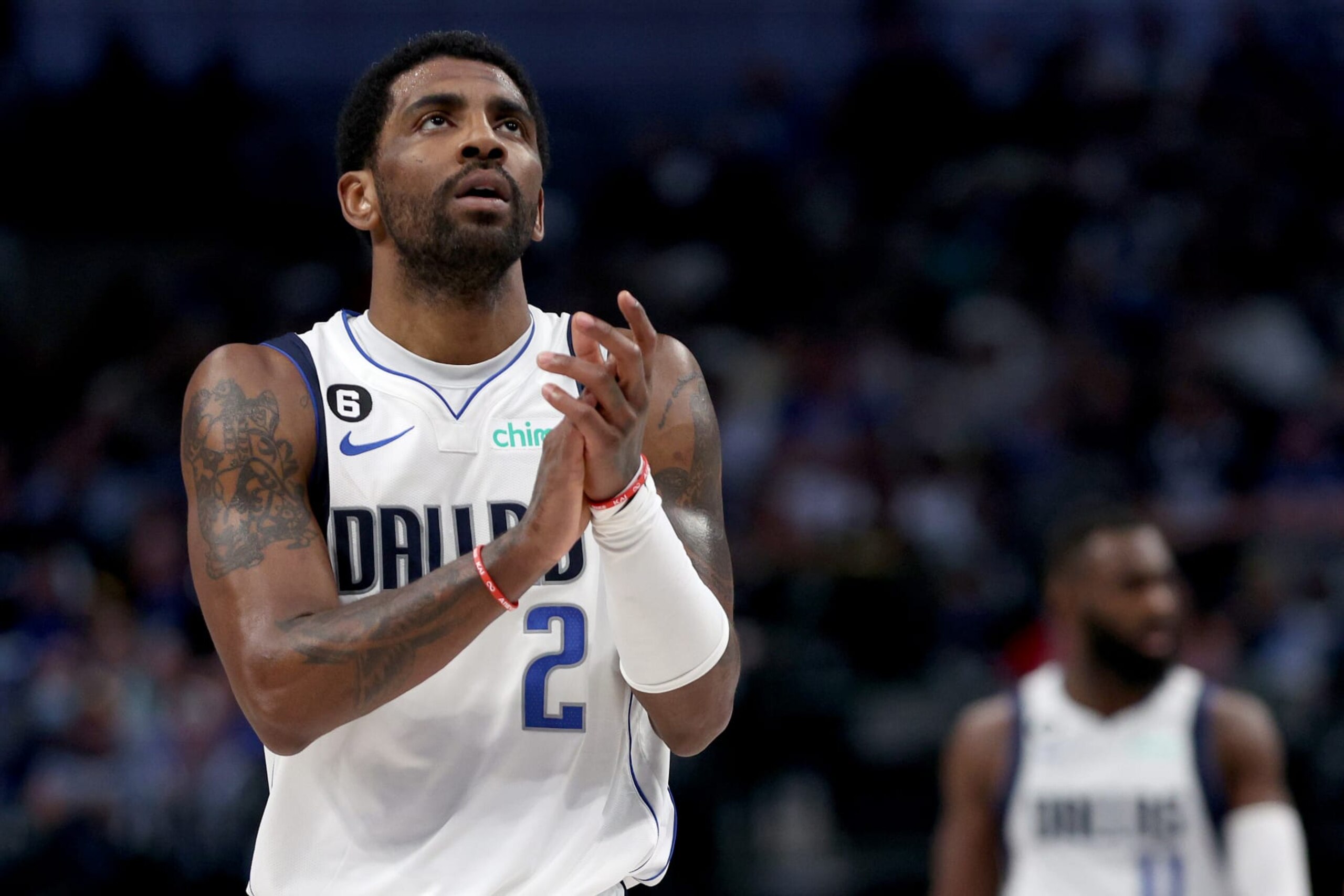 DALLAS, TEXAS - MARCH 07: Kyrie Irving #2 of the Dallas Mavericks reacts after scoring against the Utah Jazz in the fourth quarter at American Airlines Center on March 07, 2023 in Dallas, Texas. (Photo by Tom Pennington/Getty Images)
