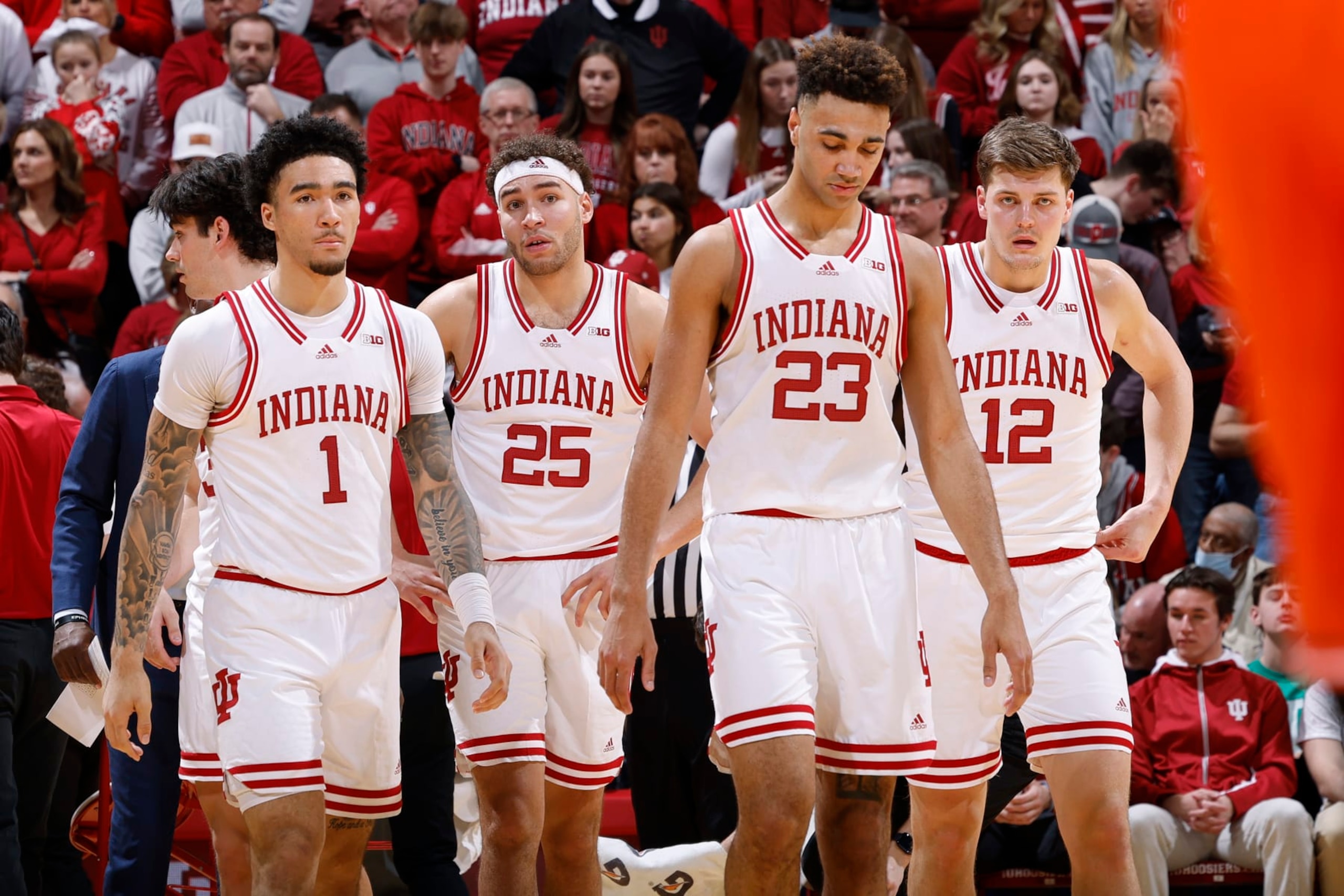 BLOOMINGTON, IN - FEBRUARY 18: Indiana Hoosiers guard Jalen Hood-Schifino (1), forward Race Thompson (25), forward Trayce Jackson-Davis (23) and forward Miller Kopp (12) walk onto the floor during a college basketball game against the Illinois Fighting Illini on February 18, 2023 at Assembly Hall in Bloomington, Indiana. (Photo by Joe Robbins/Icon Sportswire via Getty Images)