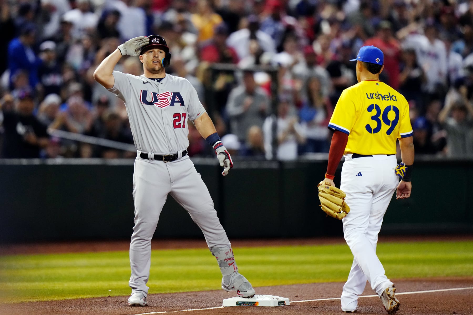 PHOENIX, AZ - MARCH 15:  Mike Trout #27 of Team USA reacts to hitting a triple in the first inning during Game 10 of Pool C between Team USA and Team Colombia at Chase Field on Wednesday, March 15, 2023 in Phoenix, Arizona. (Photo by Daniel Shirey/WBCI/MLB Photos via Getty Images)
