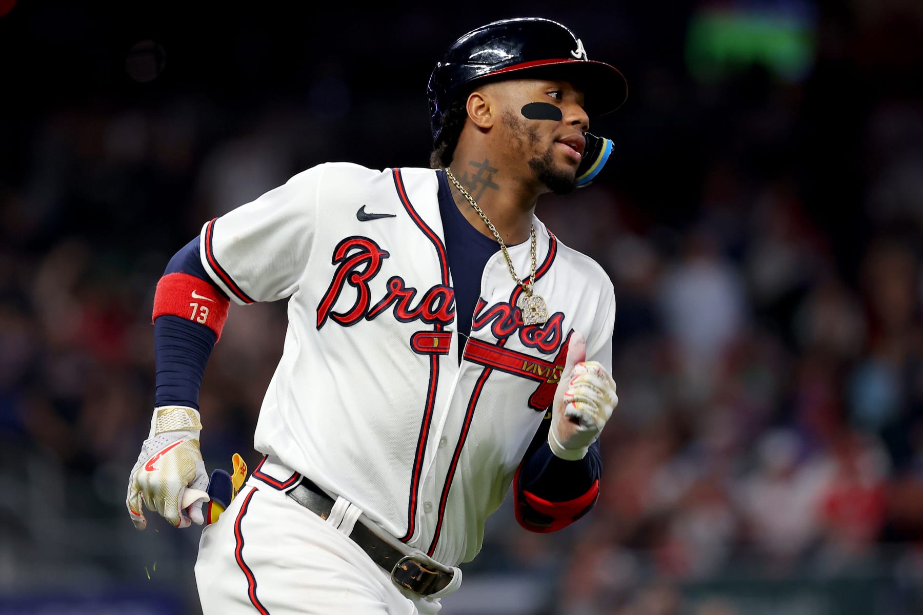 ATLANTA, GEORGIA - OCTOBER 12: Ronald Acuna Jr. #13 of the Atlanta Braves hits a single against the Philadelphia Phillies during the fourth inning in game two of the National League Division Series at Truist Park on October 12, 2022 in Atlanta, Georgia. (Photo by Kevin C. Cox/Getty Images) ATLANTA, GEORGIA - OCTOBER 12: Ronald Acuna Jr. #13 of the Atlanta Braves hits a single against the Philadelphia Phillies during the fourth inning in game two of the National League Division Series at Truist Park on October 12, 2022 in Atlanta, Georgia. (Photo by Kevin C. Cox/Getty Images)