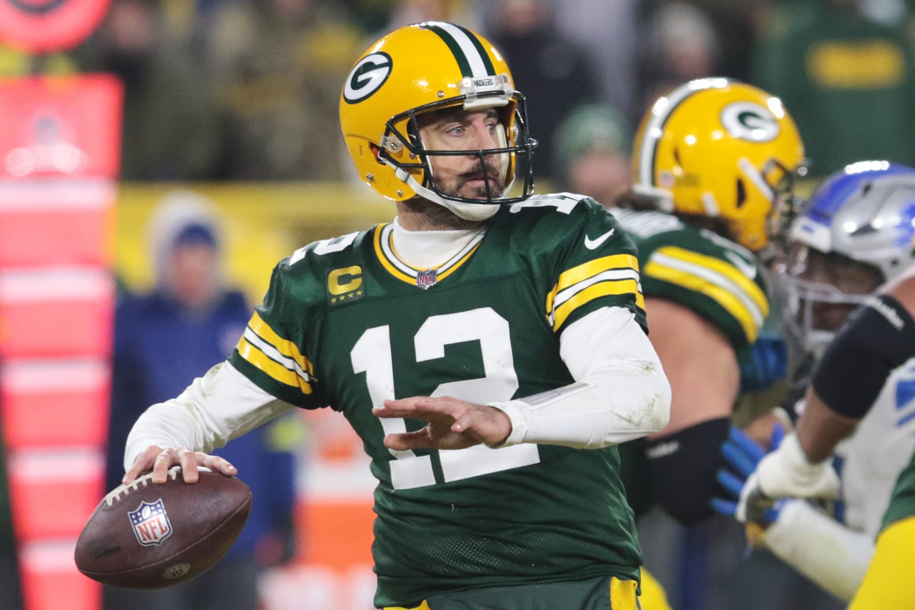 GREEN BAY, WI - JANUARY 08: Green Bay Packers quarterback Aaron Rodgers (12) passes during a game between the Green Bay Packers and the Detroit Lions at Lambeau Field on January 8, 2023 in Green Bay, WI. (Photo by Larry Radloff/Icon Sportswire via Getty Images)
