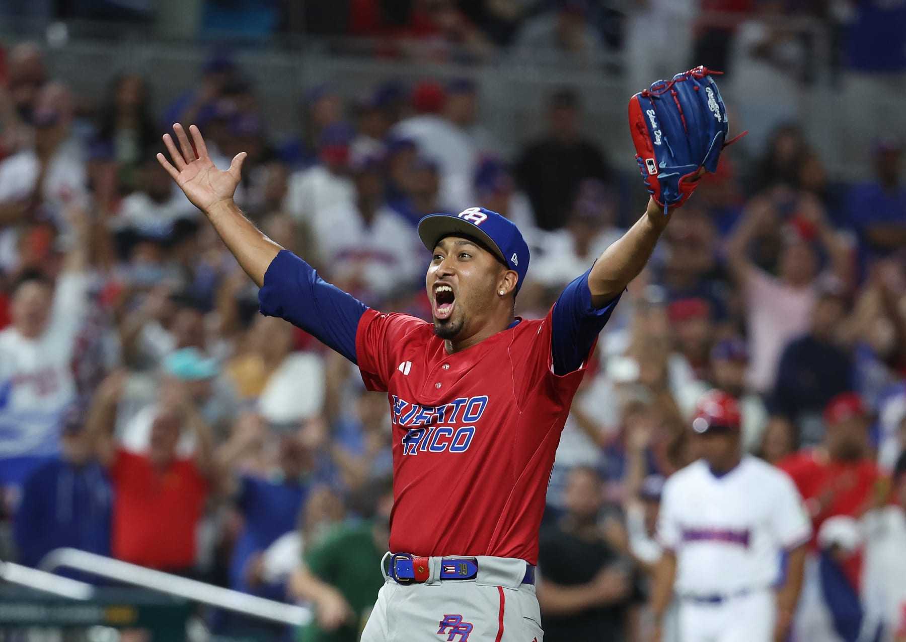 MIAMI, FLORIDA - MARCH 15:  Edwin Diaz #39 of Team Puerto Rico celebrates a 5-2 win against Team Dominican Republic during their World Baseball Classic Pool D game at loanDepot park on March 15, 2023 in Miami, Florida. (Photo by Al Bello/Getty Images)