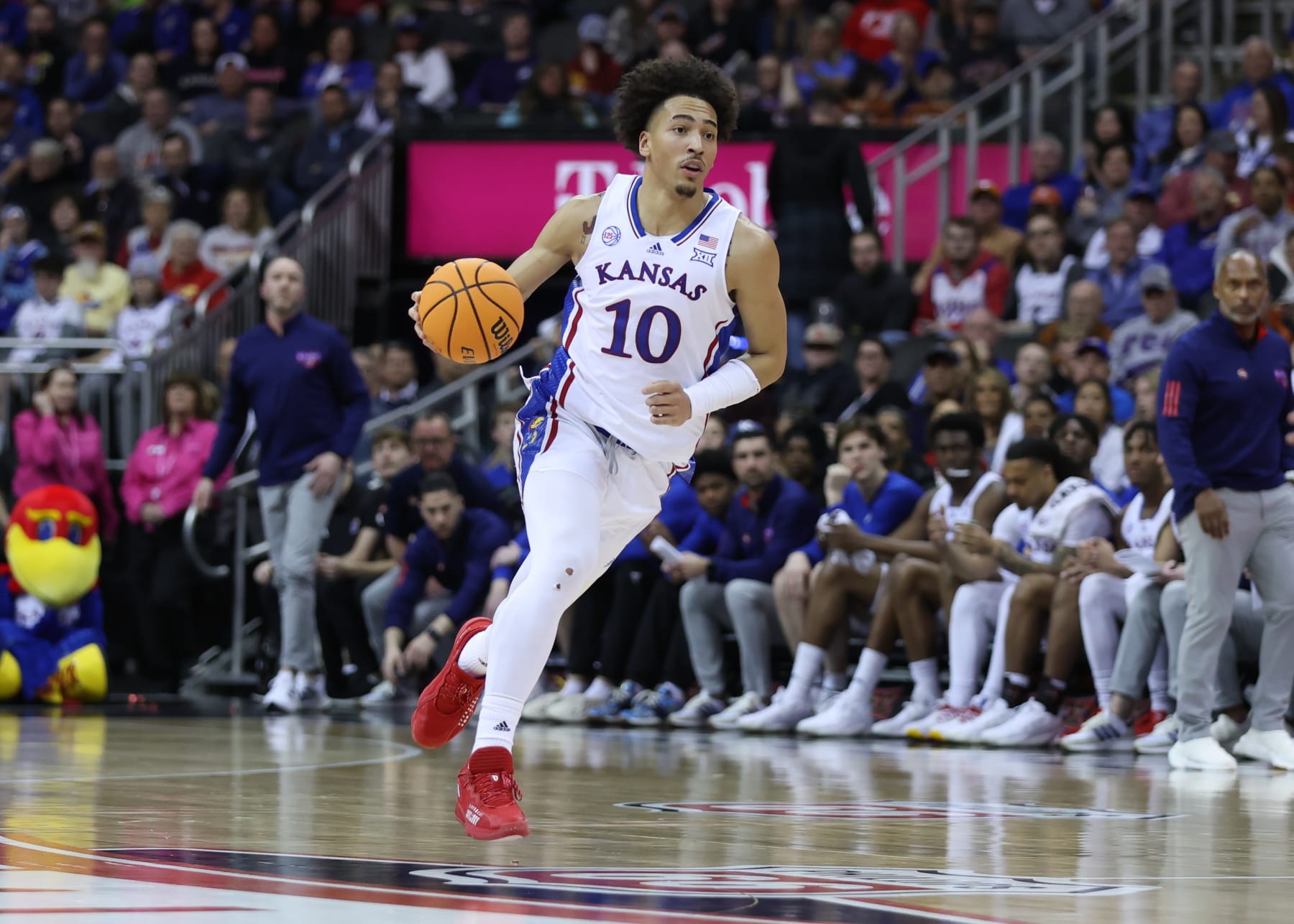 KANSAS CITY, MO - MARCH 10: Kansas Jayhawks forward Jalen Wilson (10) leads the fast break in the first half of a Big 12 Tournament semifinal basketball game between the Iowa State Cyclones and Kansas Jayhawks on March 10, 2023 at T-Mobile Center in Kansas City, MO. (Photo by Scott Winters/Icon Sportswire via Getty Images)