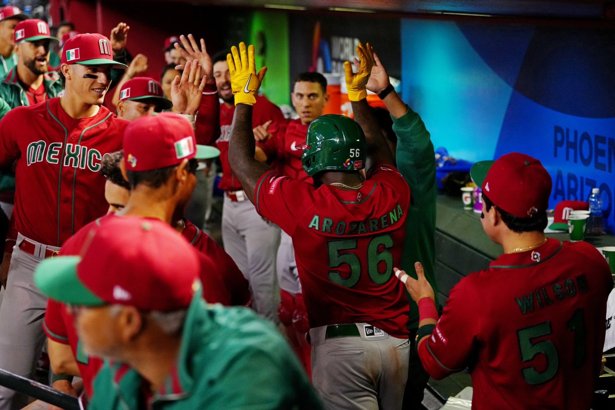 PHOENIX, AZ - MARCH 15:  Randy Arozarena #56 of Team Mexico is greeted in the dugout after scoring a run in the sixth inning during Game 9 of Pool C between Team Mexico and Team Canada at Chase Field on Wednesday, March 15, 2023 in Phoenix, Arizona. (Photo by Daniel Shirey/WBCI/MLB Photos via Getty Images)