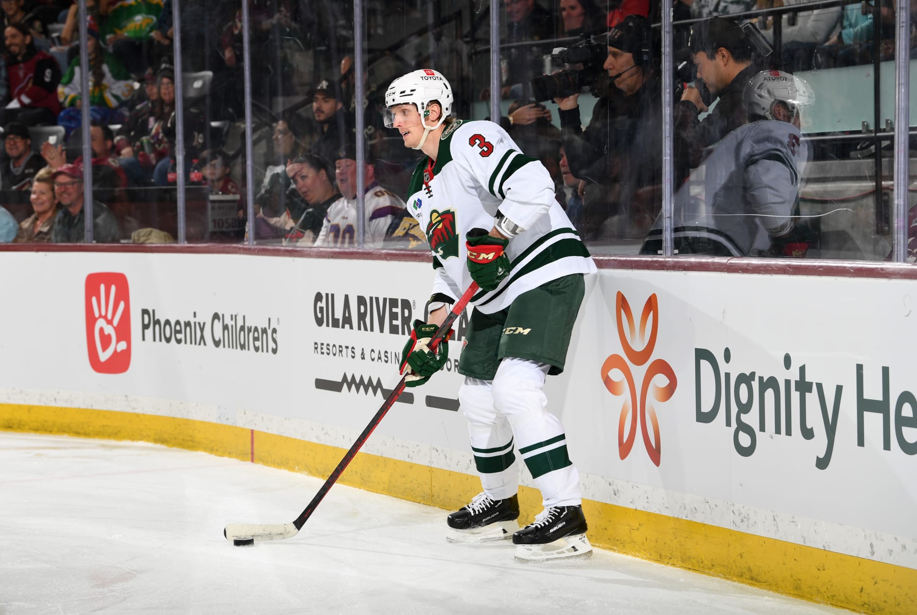 TEMPE, ARIZONA - MARCH 12: John Klingberg #3 of the Minnesota Wild skates with the puck against the Arizona Coyotes at Mullett Arena on March 12, 2023 in Tempe, Arizona. (Photo by Norm Hall/NHLI via Getty Images)