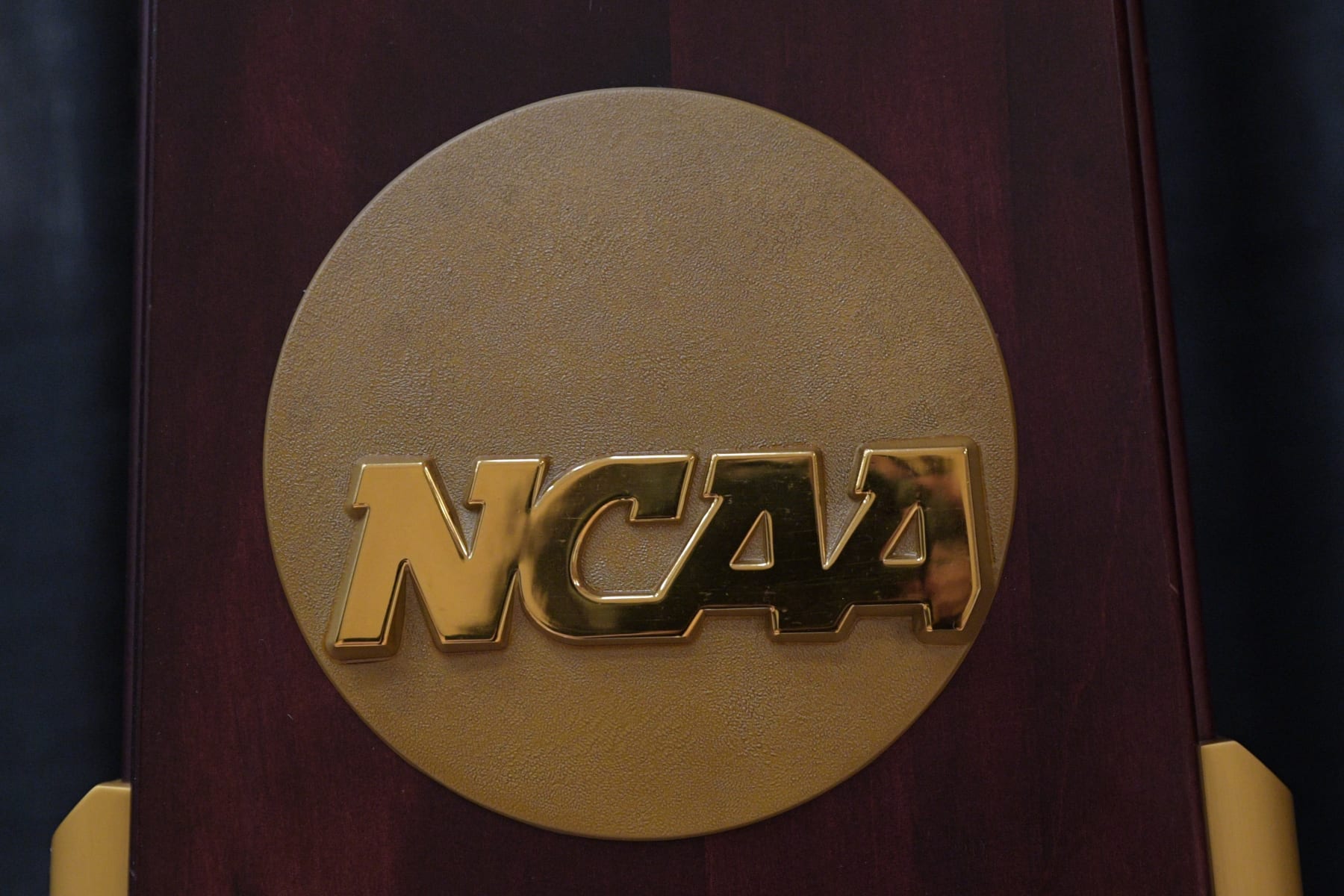PROVIDENCE, RI - NOVEMBER 27: The NCAA logo on the 2023 Division I Men's Basketball National Championship trophy on display prior to a college basketball game between the Maine Black Bears and the Brown Bears on November 27, 2022, at Pizzitola Sports Center in Providence, RI. (Photo by Erica Denhoff/Icon Sportswire via Getty Images)