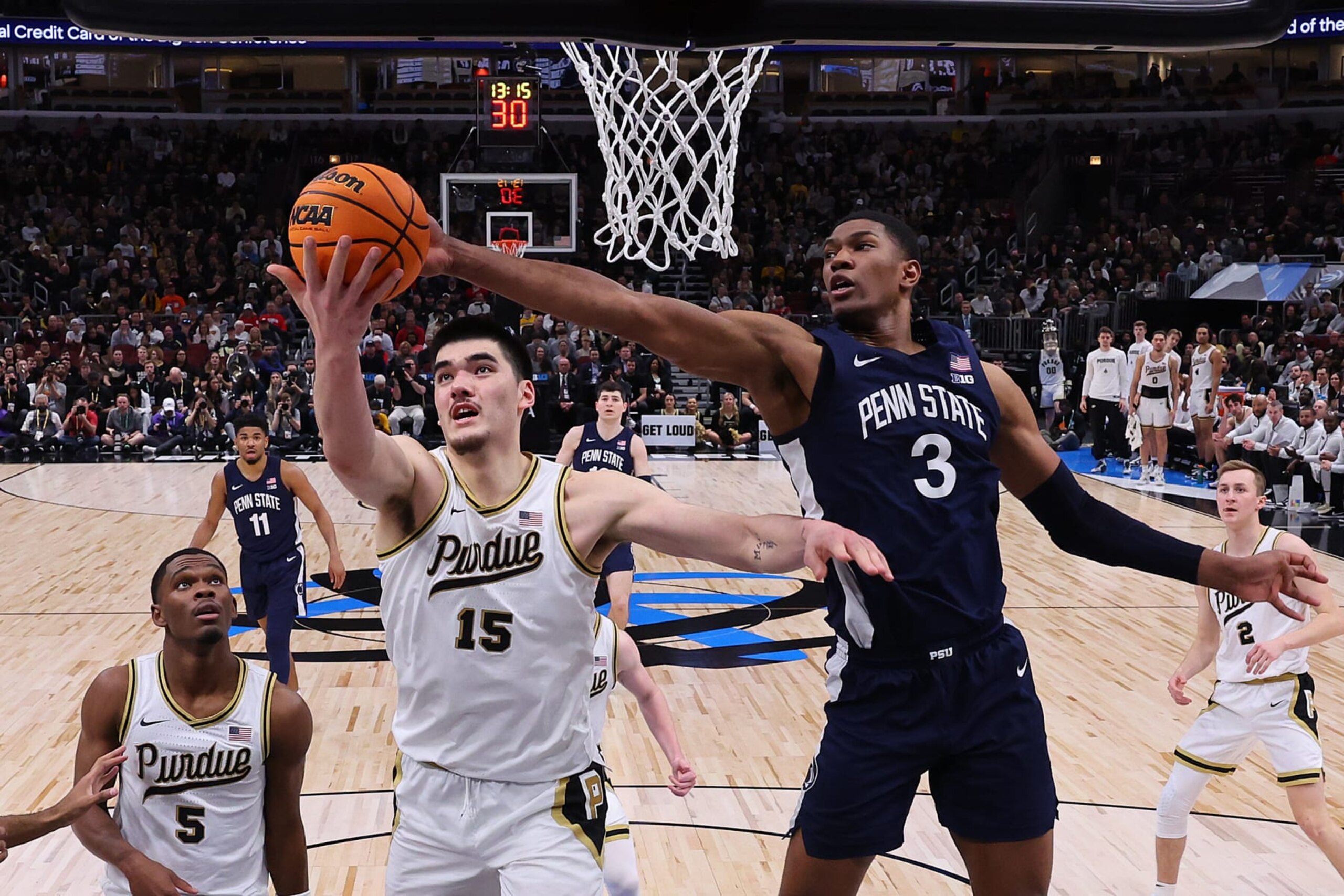 CHICAGO, ILLINOIS - MARCH 12: Zach Edey #15 of the Purdue Boilermakers and Kebba Njie #3 of the Penn State Nittany Lions battle for a rebound during the Big Ten Basketball Tournament Championship game at United Center on March 12, 2023 in Chicago, Illinois. (Photo by Michael Reaves/Getty Images)