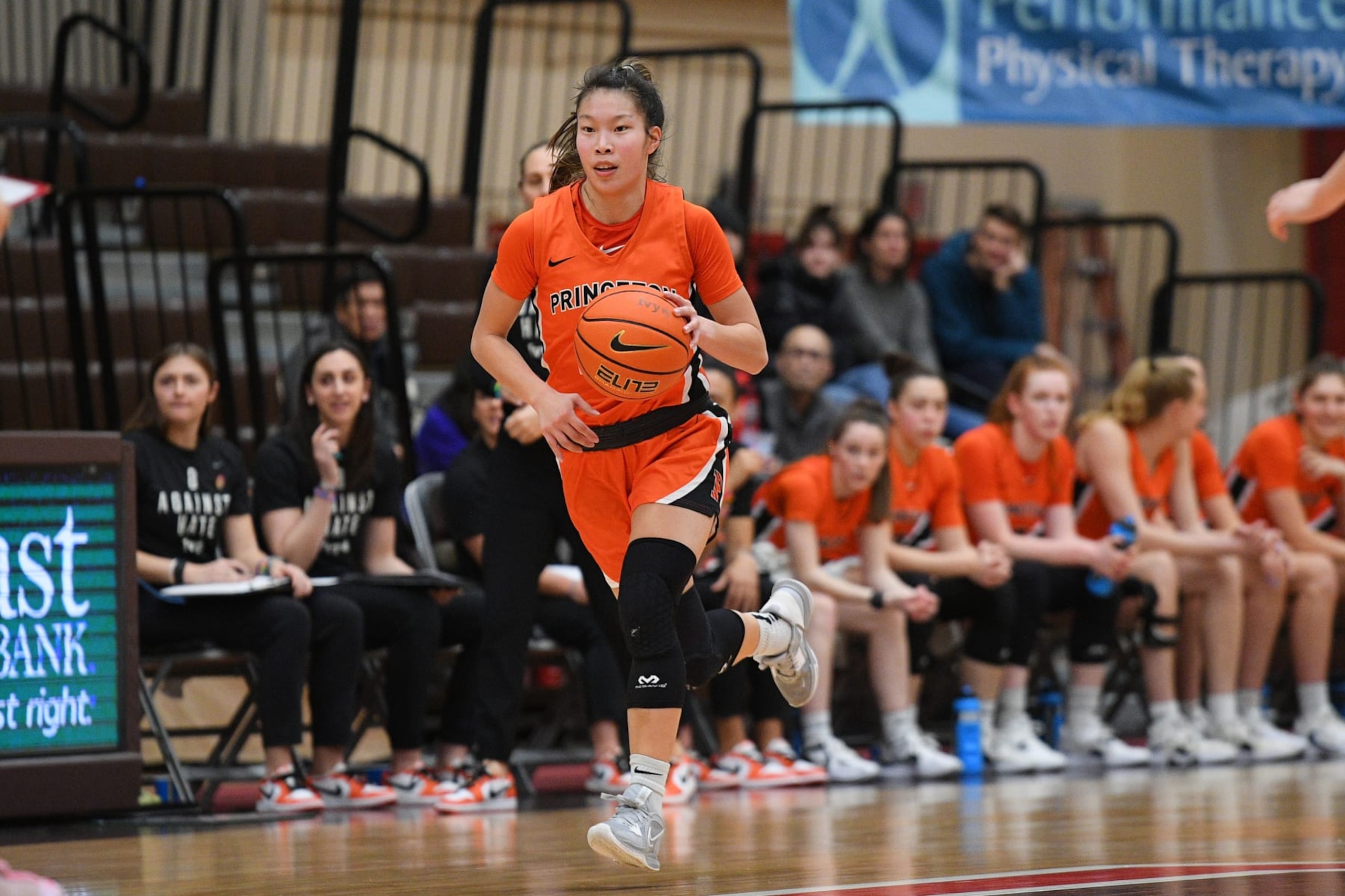 PROVIDENCE, RI - FEBRUARY 17: Princeton Tigers guard Kaitlyn Chen (20) brings the ball up the court during a women's college basketball game between the Princeton Tigers and the Brown Bears on February 17, 2023, at the Pizzitola Sports Center in Providence, RI. (Photo by Erica Denhoff/Icon Sportswire via Getty Images)