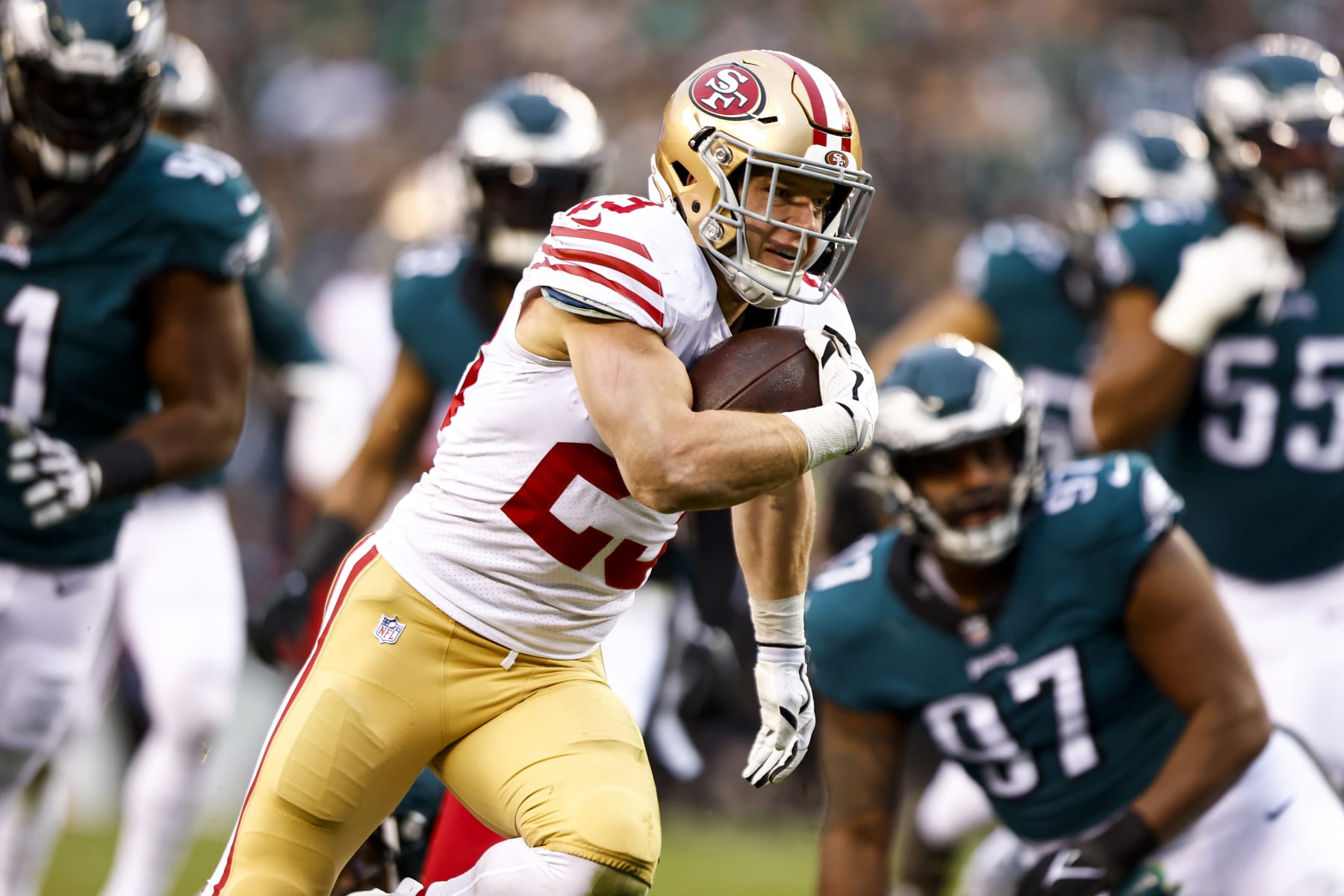 PHILADELPHIA, PA - JANUARY 29: Christian McCaffrey #23 of the San Francisco 49ers carries the ball to score a touchdown during the second quarter of the NFC Championship NFL football game against the Philadelphia Eagles at Lincoln Financial Field on January 29, 2023 in Philadelphia, Pennsylvania. (Photo by Kevin Sabitus/Getty Images)