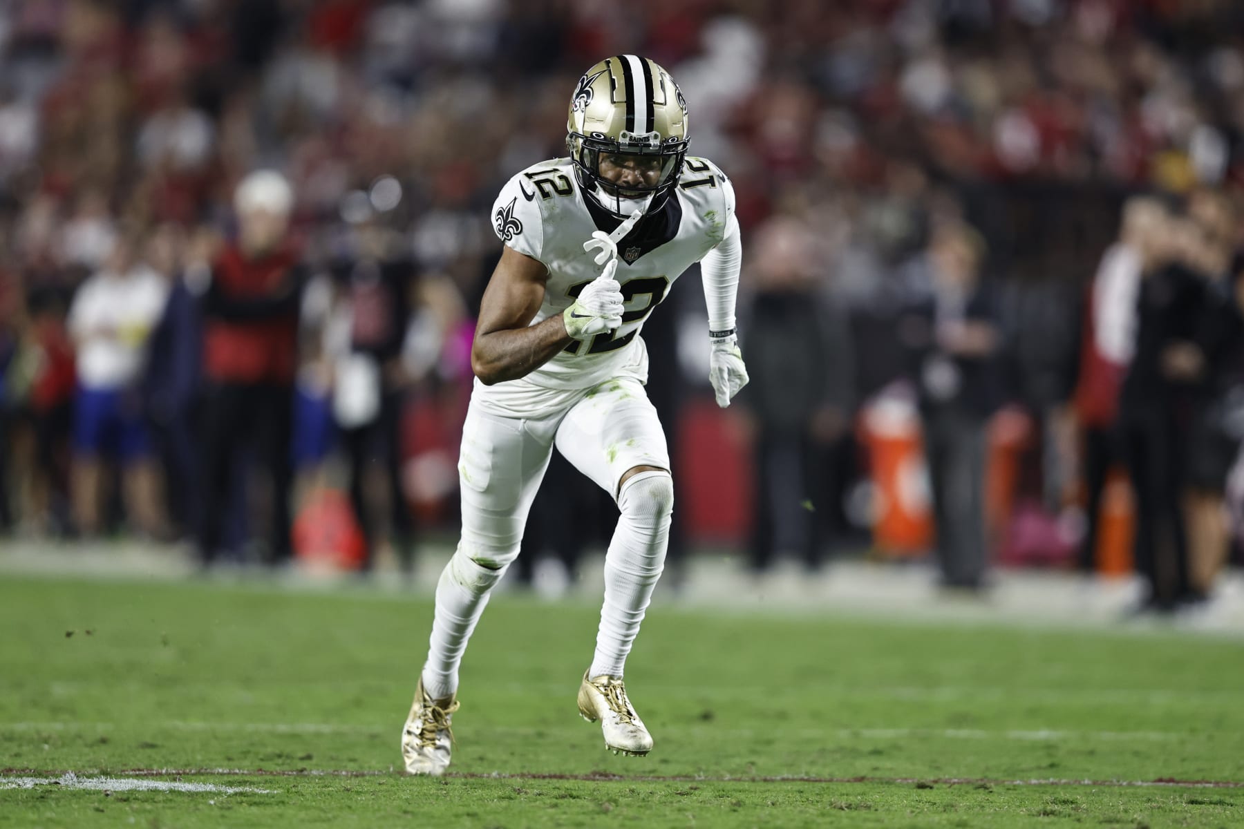 GLENDALE, ARIZONA - OCTOBER 20: Chris Olave #12 of the New Orleans Saints runs during a game between the Arizona Cardinals and the New Orleans Saints at State Farm Stadium on October 20, 2022 in Glendale, Arizona. (Photo by Michael Owens/Getty Images)