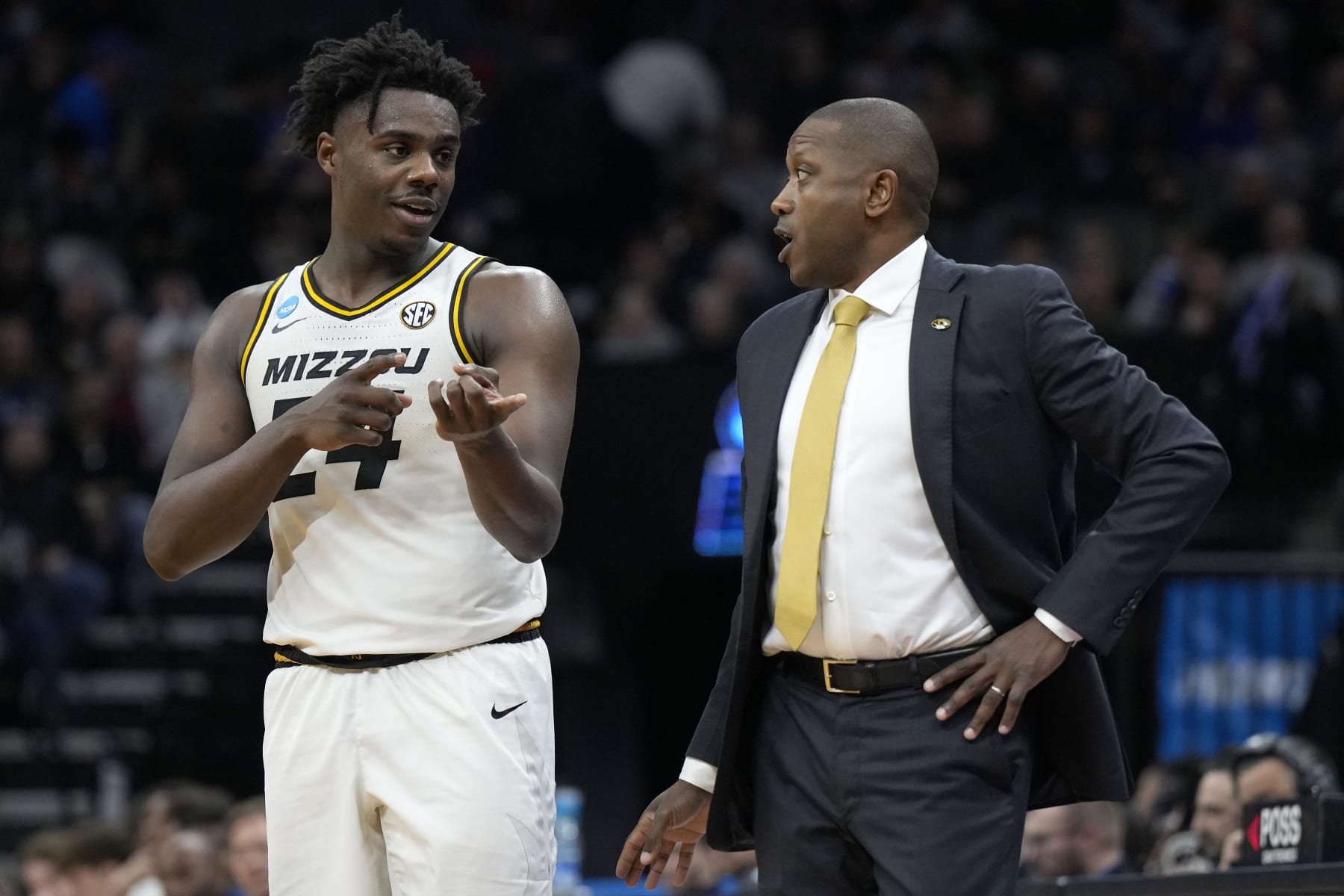 Missouri's Kobe Brown and Dennis Gates