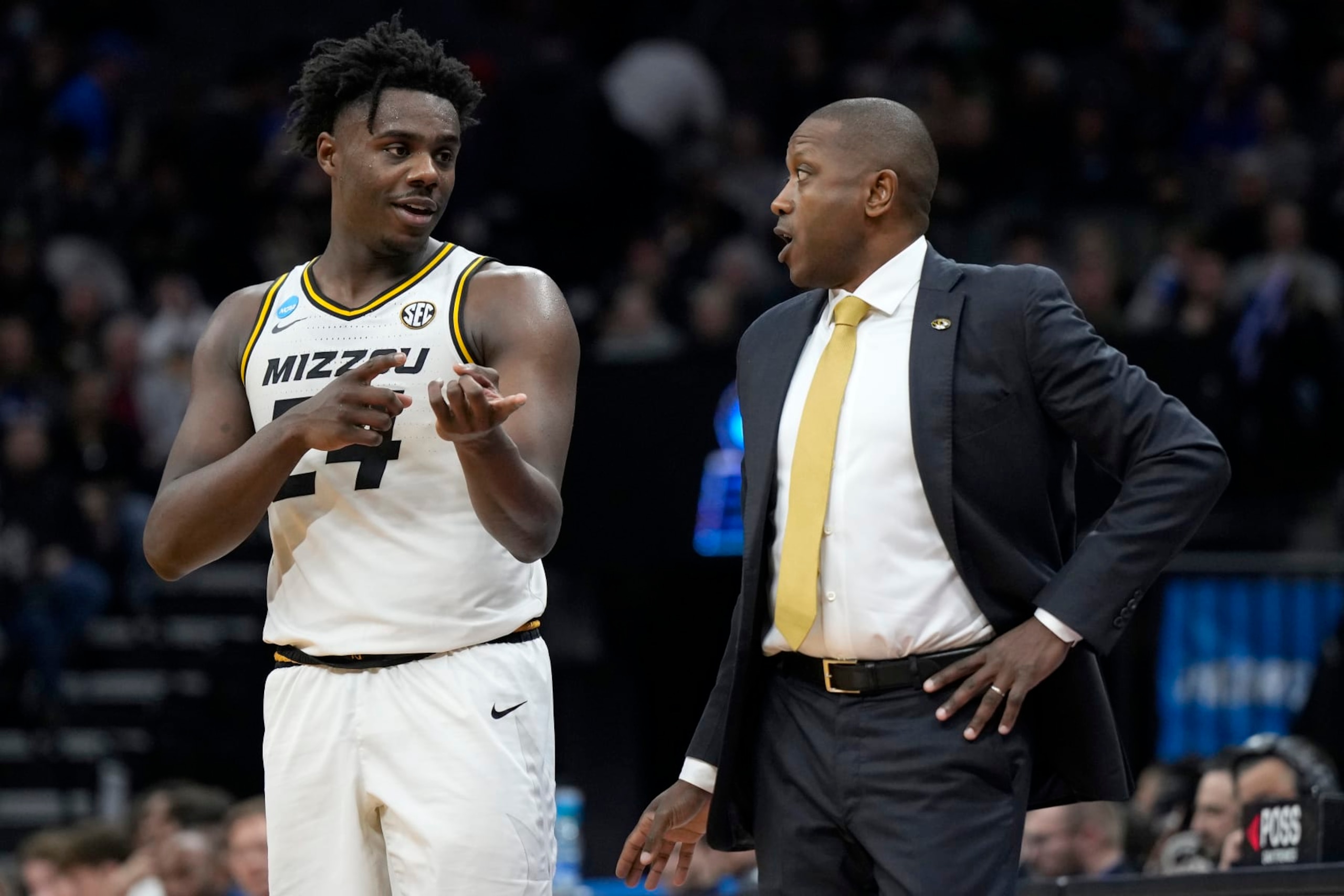 Missouri's Kobe Brown and Dennis Gates
