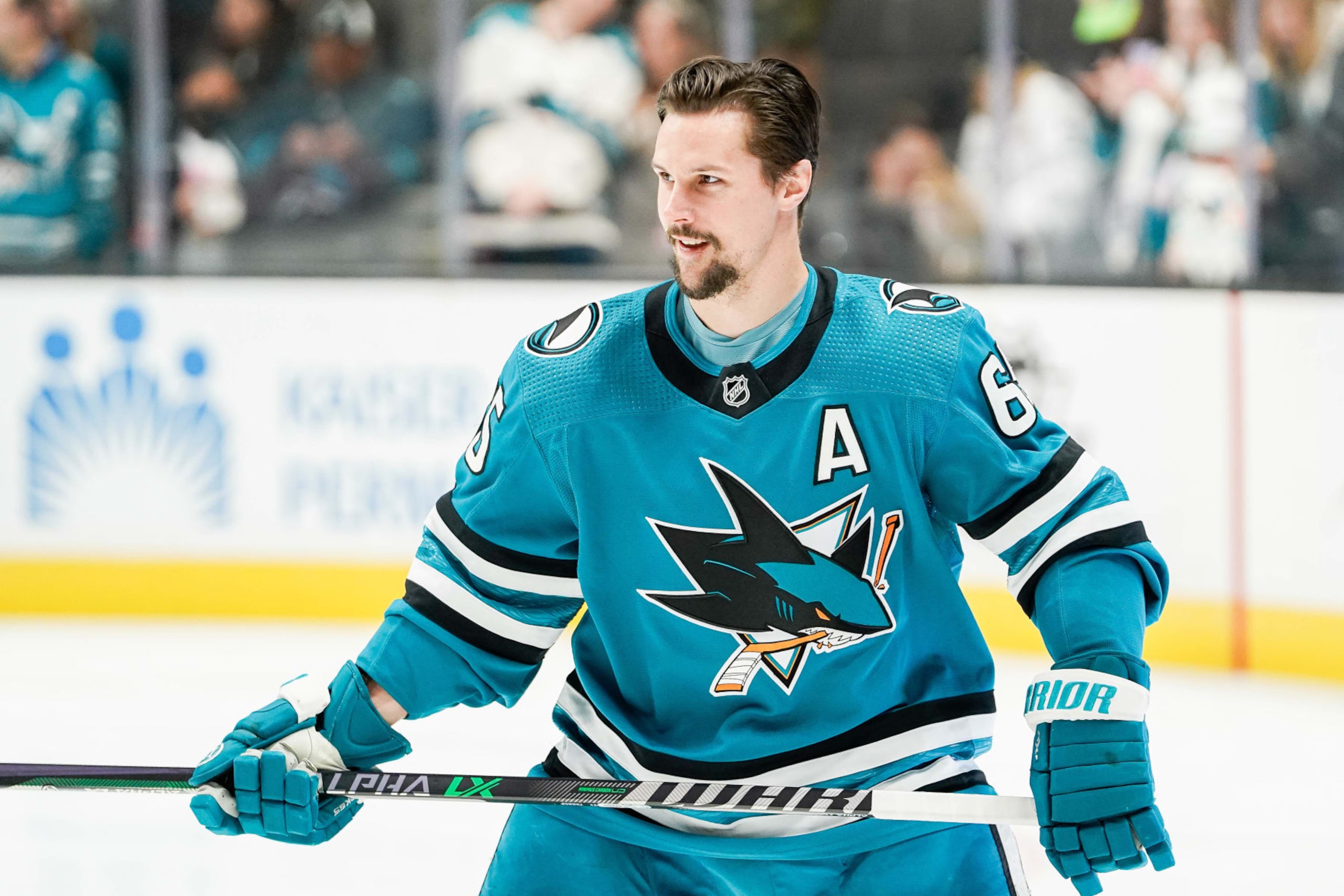 SAN JOSE, CA - MARCH 11: Erik Karlsson #65 of the San Jose Sharks smiles during warm ups at SAP Center on March 11, 2023 in San Jose, California. (Photo by Andreea Cardani/NHLI via Getty Images)