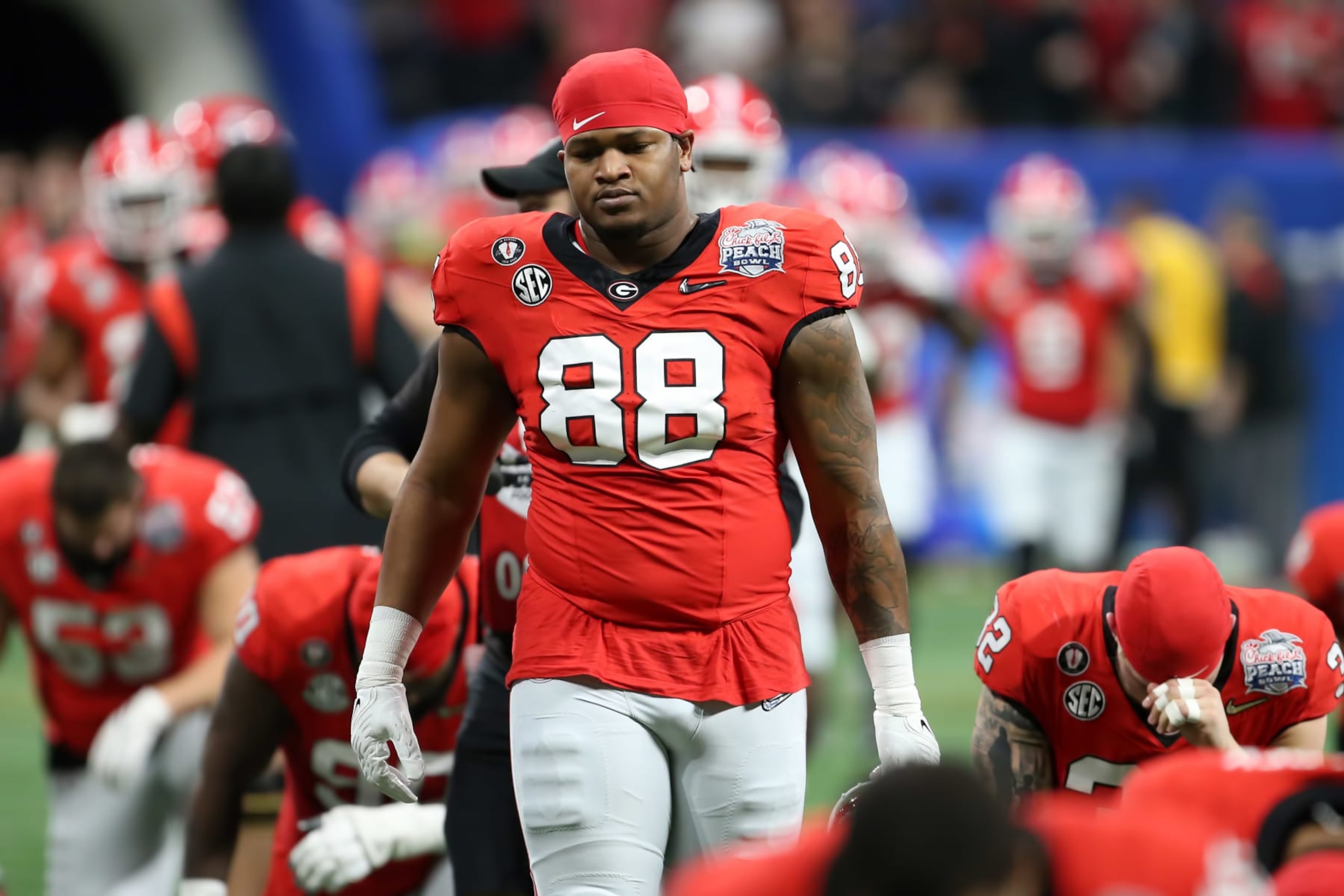 ATLANTA, GA - DECEMBER 31:  Georgia Bulldogs defensive lineman Jalen Carter (88) during the college football Playoff Semifinal game at the Chick-fil-a Peach Bowl between the Georgia Bulldogs and the Ohio State Buckeyes on December 31, 2022 at Mercedes-Benz Stadium in Atlanta, Georgia.  (Photo by Michael Wade/Icon Sportswire via Getty Images)