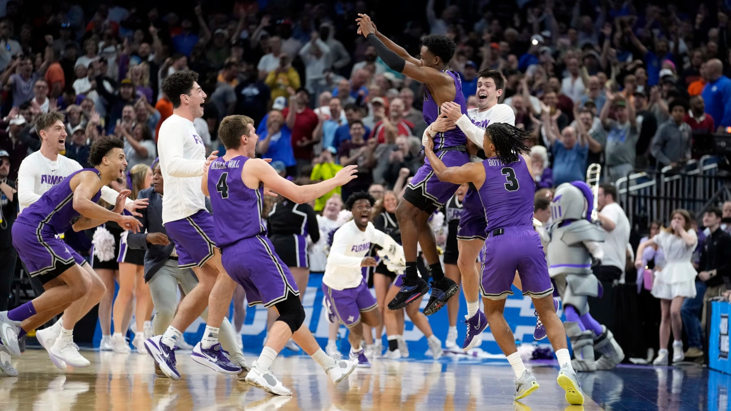 Furman celebrates its win over Virginia. Furman celebrates its win over Virginia.