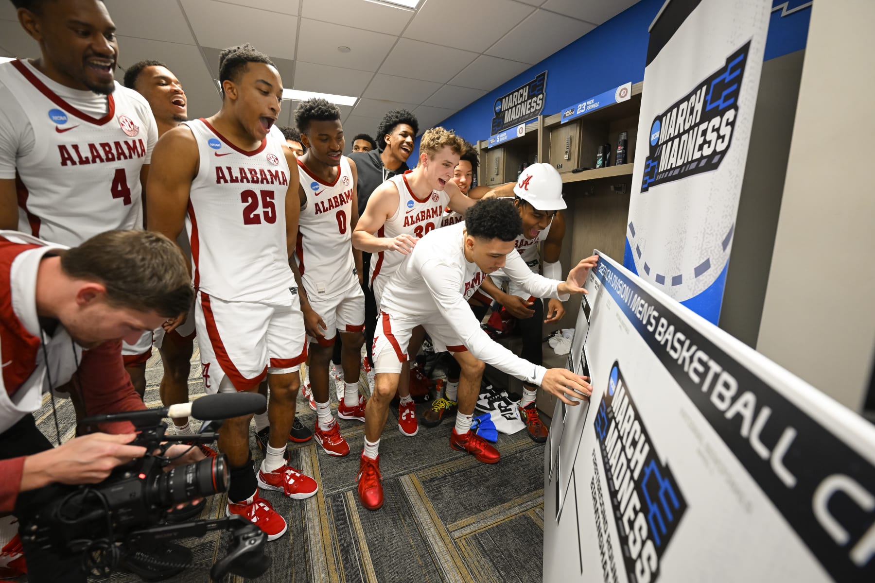 BIRMINGHAM, AL - MARCH 16: Alabama Crimson Tides celebrates and moves their name to the second round after the win against Texas A&M-Corpus Christi Islanders during the first round of the 2023 NCAA Men's Basketball Tournament held at Legacy Arena at the BJCC on March 16, 2023 in Birmingham, Alabama. (Photo by Andy Hancock/NCAA Photos via Getty Images)