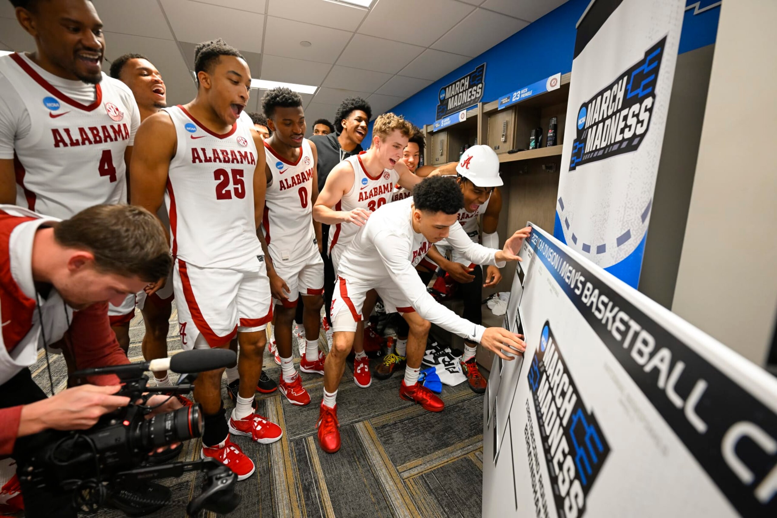 BIRMINGHAM, AL - MARCH 16: Alabama Crimson Tides celebrates and moves their name to the second round after the win against Texas A&M-Corpus Christi Islanders during the first round of the 2023 NCAA Men's Basketball Tournament held at Legacy Arena at the BJCC on March 16, 2023 in Birmingham, Alabama. (Photo by Andy Hancock/NCAA Photos via Getty Images) BIRMINGHAM, AL - MARCH 16: Alabama Crimson Tides celebrates and moves their name to the second round after the win against Texas A&M-Corpus Christi Islanders during the first round of the 2023 NCAA Men's Basketball Tournament held at Legacy Arena at the BJCC on March 16, 2023 in Birmingham, Alabama. (Photo by Andy Hancock/NCAA Photos via Getty Images)