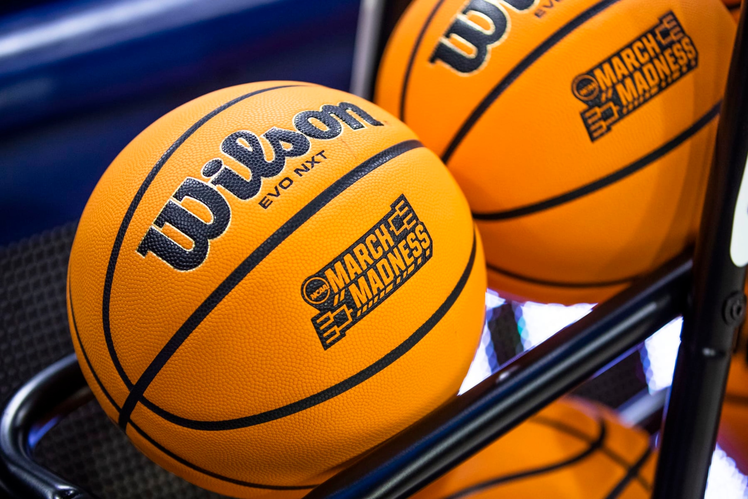 Basketball with a March Madness logo sit on a rack before a First Four game between Illinois and Mississippi State in the NCAA women's college basketball tournament Wednesday, March 15, 2023, in South Bend, Ind. (AP Photo/Michael Caterina) Basketball with a March Madness logo sit on a rack before a First Four game between Illinois and Mississippi State in the NCAA women's college basketball tournament Wednesday, March 15, 2023, in South Bend, Ind. (AP Photo/Michael Caterina)