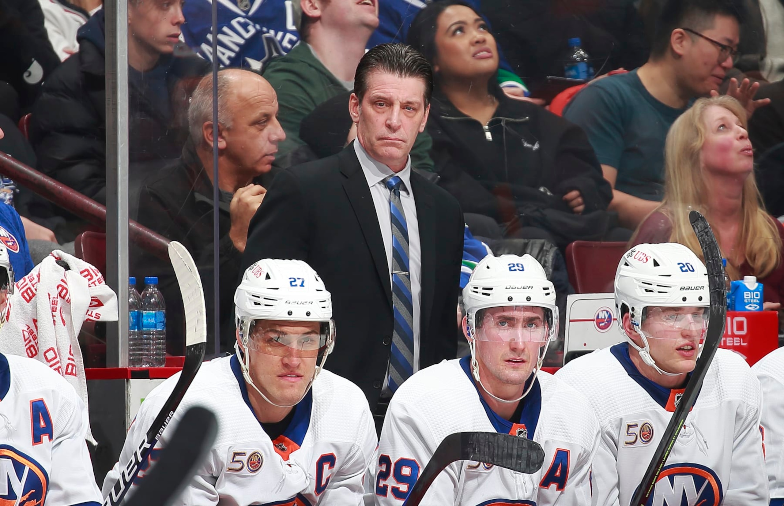 VANCOUVER, CANADA - JANUARY 3: Head coach Lane Lambert of the New York Islanders looks on from the bench during their NHL game against the Vancouver Canucks at Rogers Arena January 3, 2023 in Vancouver, British Columbia, Canada.  (Photo by Jeff Vinnick/NHLI via Getty Images)