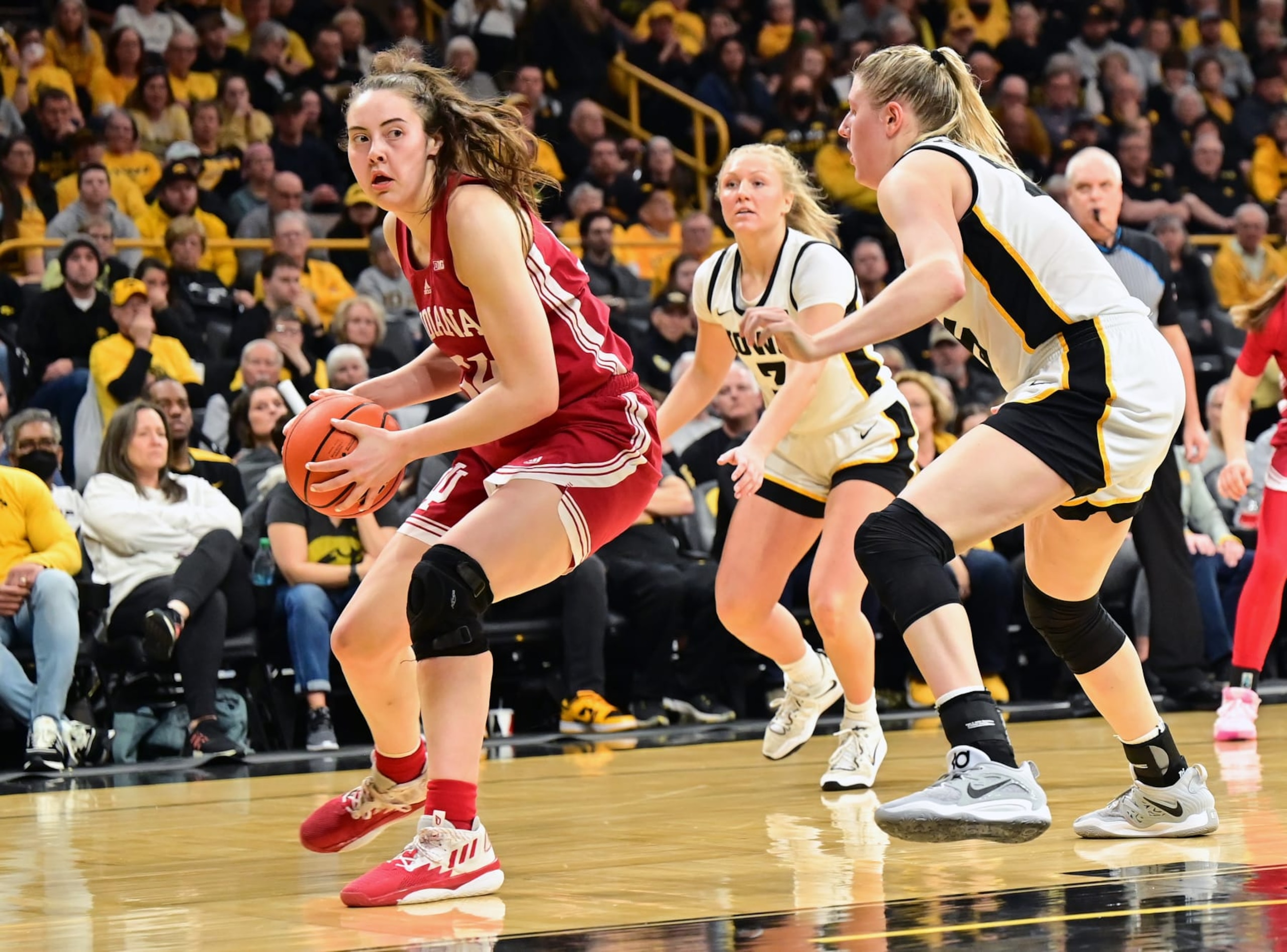 IOWA CITY, IA - FEBRUARY 26: Indiana Hoosiers forward Mackenzie Holmes (54) tries to set up a shot during a women's college basketball game between the Indiana Hoosiers and the Iowa Hawkeyes on February 26, 2023, at Carver-Hawkeye Arena in Iowa City, IA (Photo by Keith Gillett/Icon Sportswire via Getty Images) IOWA CITY, IA - FEBRUARY 26: Indiana Hoosiers forward Mackenzie Holmes (54) tries to set up a shot during a women's college basketball game between the Indiana Hoosiers and the Iowa Hawkeyes on February 26, 2023, at Carver-Hawkeye Arena in Iowa City, IA (Photo by Keith Gillett/Icon Sportswire via Getty Images)