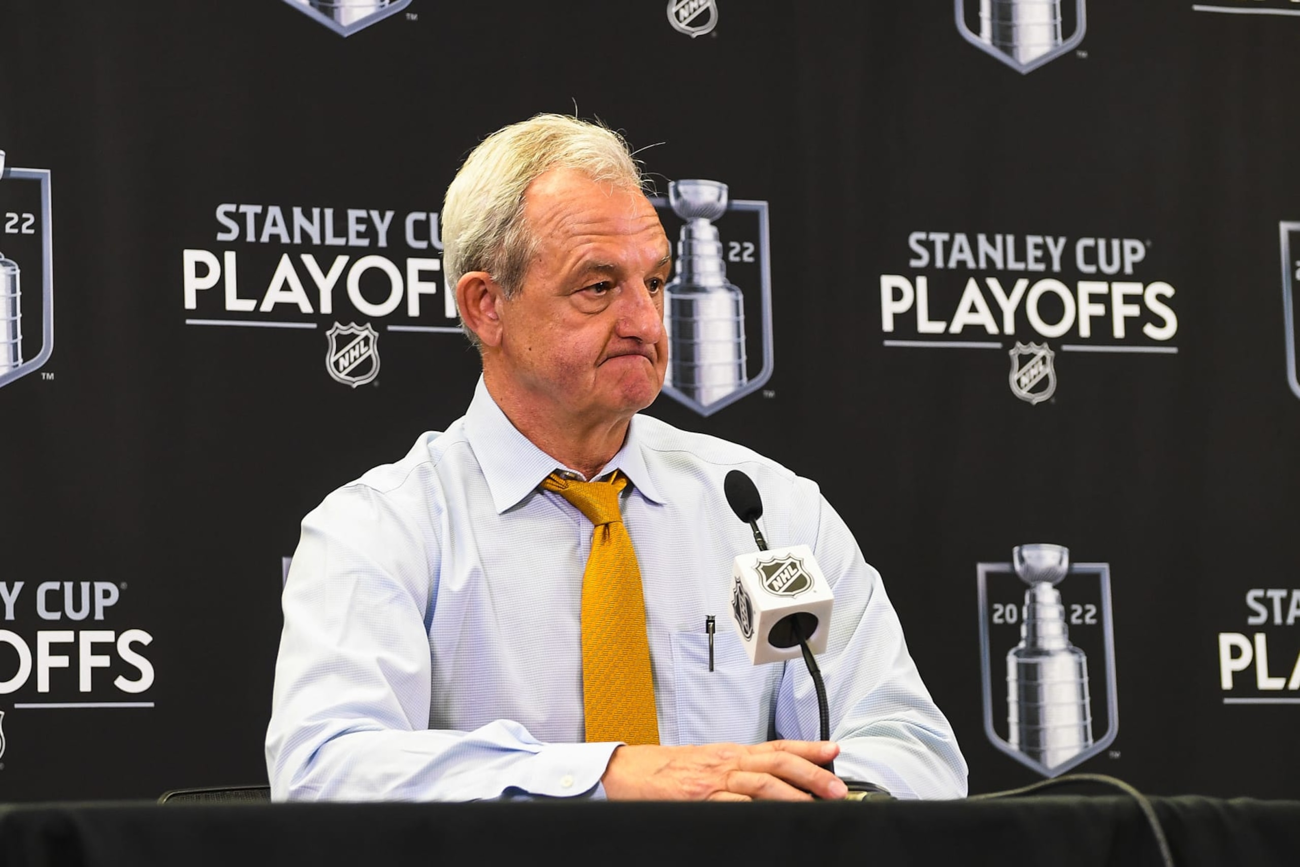 CALGARY, AB - MAY 26: Head coach of the Calgary Flames, Darryl Sutter, speaks to media after losing to the Edmonton Oilers during the overtime period of Game Five of the Second Round of the 2022 Stanley Cup Playoffs at Scotiabank Saddledome on May 26, 2022 in Calgary, Alberta, Canada. The Flames defeated the Oilers 5-4 in overtime to win the series 4-1. (Photo by Derek Leung/Getty Images)