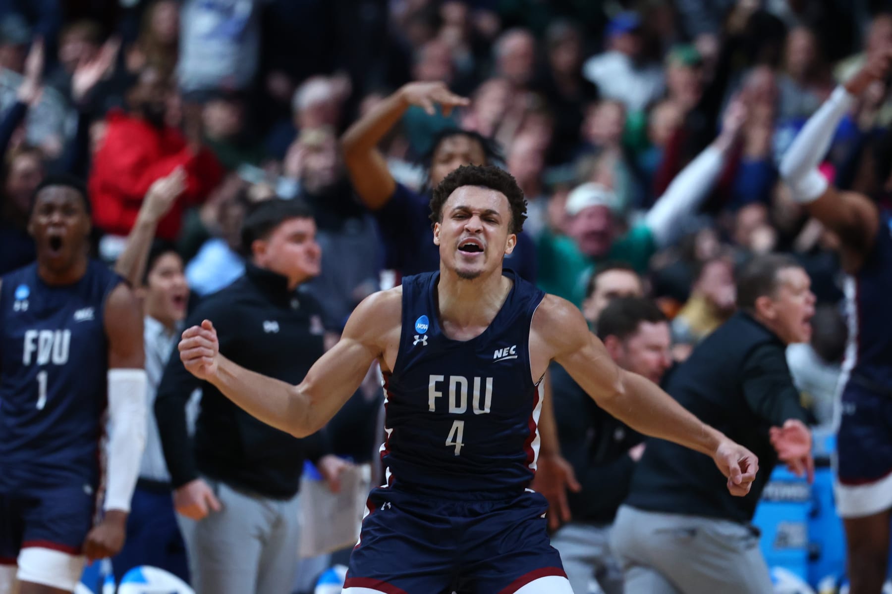 COLUMBUS, OH - MARCH 17: Grant Singleton #4 of the Fairleigh Dickinson Knights reacts to making a play against the Purdue Boilermakers during the first round of the 2022 NCAA Men's Basketball Tournament held at Nationwide Arena on March 17, 2023 in Columbus, Ohio. (Photo by Tyler Schank/NCAA Photos via Getty Images)