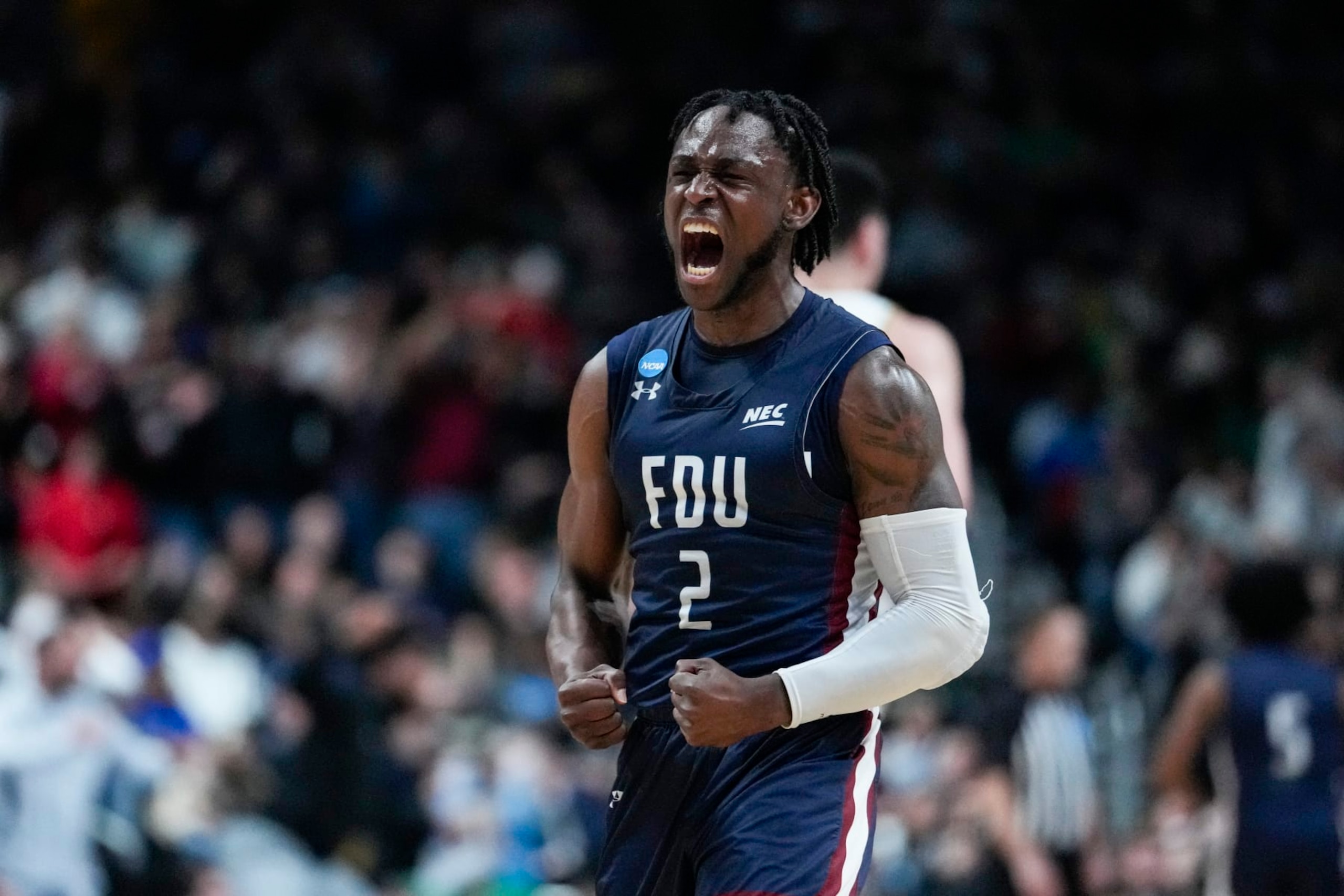 Fairleigh Dickinson guard Demetre Roberts (2) celebrates in the second half of a first-round college basketball game against Purdue in the men's NCAA Tournament in Columbus, Ohio, Friday, March 17, 2023. (AP Photo/Michael Conroy)