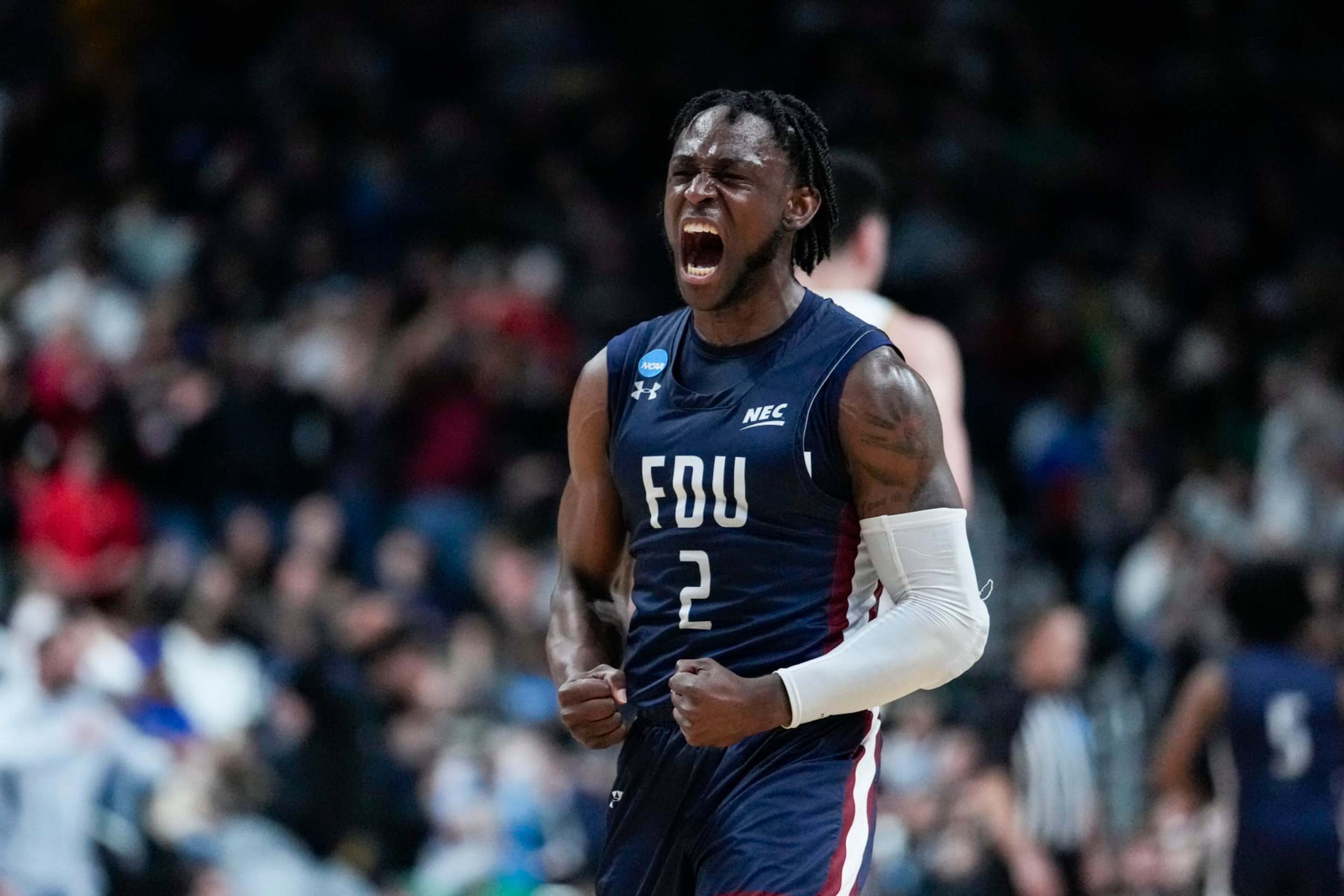 Fairleigh Dickinson guard Demetre Roberts (2) celebrates in the second half of a first-round college basketball game against Purdue in the men's NCAA Tournament in Columbus, Ohio, Friday, March 17, 2023. (AP Photo/Michael Conroy)
