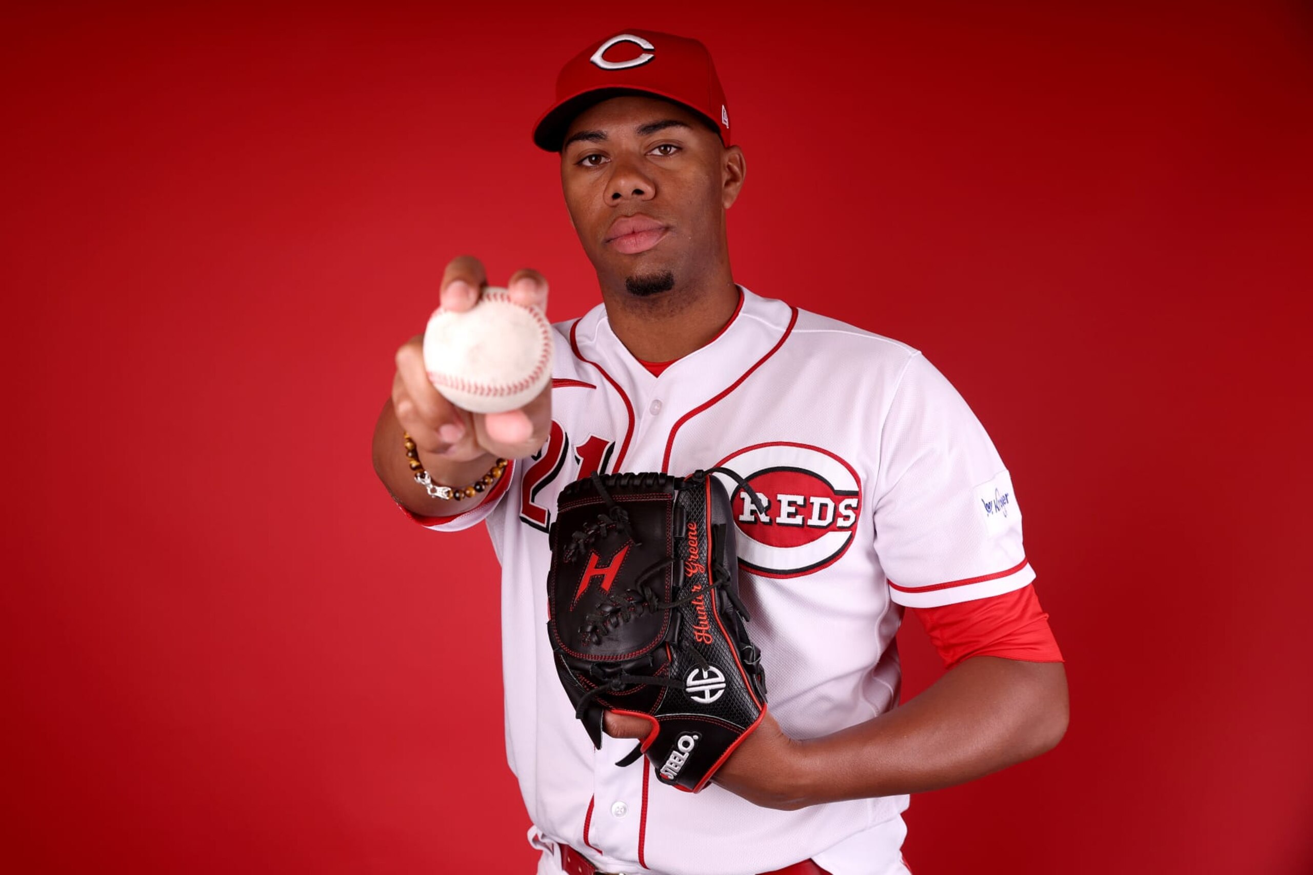 GOODYEAR, ARIZONA - FEBRUARY 21: Hunter Greene #21 of the Cincinnati Reds poses for a portrait during photo day at Goodyear Ballpark on February 21, 2023 in Goodyear, Arizona. (Photo by Steph Chambers/Getty Images)