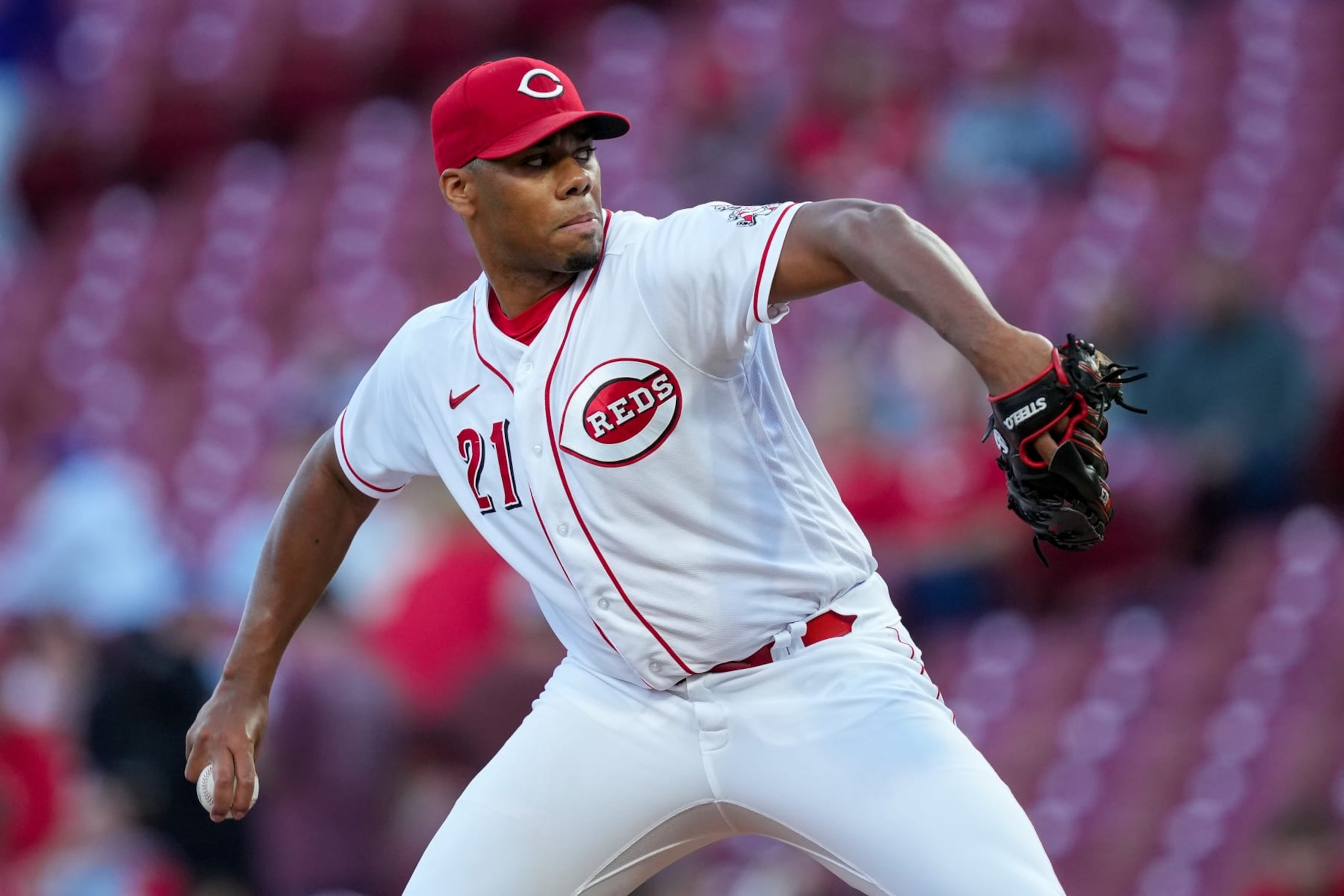CINCINNATI, OHIO - OCTOBER 03: Hunter Greene #21 of the Cincinnati Reds pitches in the first inning against the Chicago Cubs at Great American Ball Park on October 03, 2022 in Cincinnati, Ohio. (Photo by Dylan Buell/Getty Images)